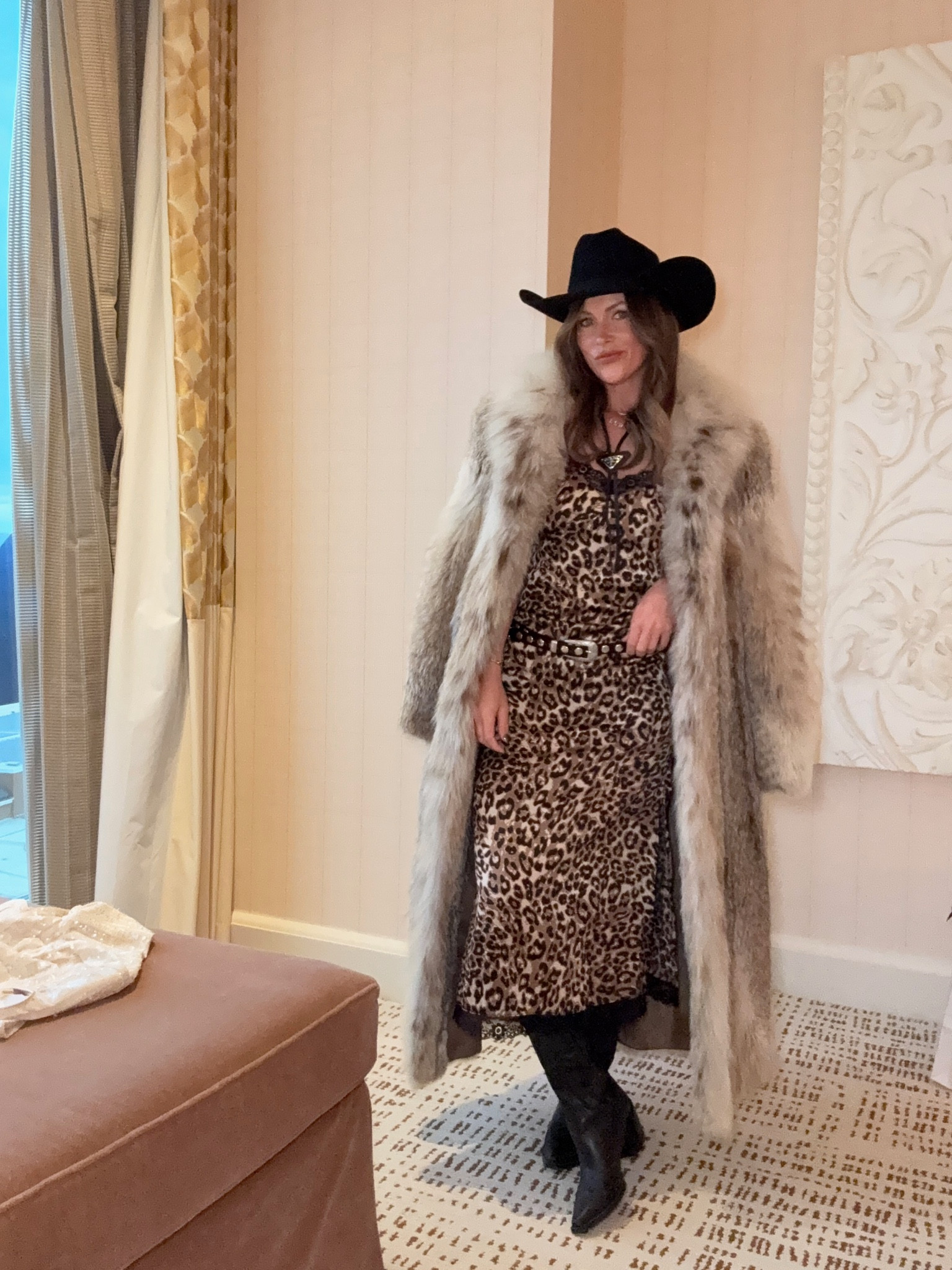 NFR Outfit! 
Fur vest from cowboy Christmas event 
Leopard dress is glitzy Bella use code ASHLEE20 for 20% off! 
Jeffrey Campbell boots 
Western hat & belt glitzy Bella 

#LTKStyleTip