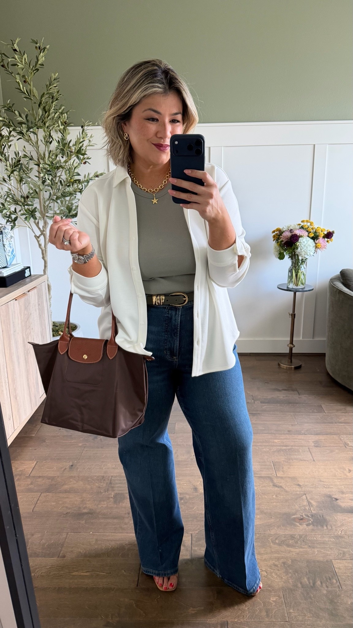 I’m wearing a large in the AirEssentials button up. Depending on how oversized you like it, either stay true to size or size up. I own it in both a large and XL and love the fit of both. 

My typical size in all Authentic 360 jeans is an XL, petite. I initially ordered these in that exact size, however, I decided to re-order a 1X (regular inseam). While they fit a bit more loose, I much prefer comfort over the label in my pants. These jeans just happened to run a bit smaller than the others, but that’s what I’m here for—to test it out and let you know exactly how they fit so you can make the best decision for yourself when ordering!

Use code CMCLAIREXSPANX for 15% off your first purchase + free shipping, excluding sales.

#LTKootd #LTKOver40 #LTKMidsize