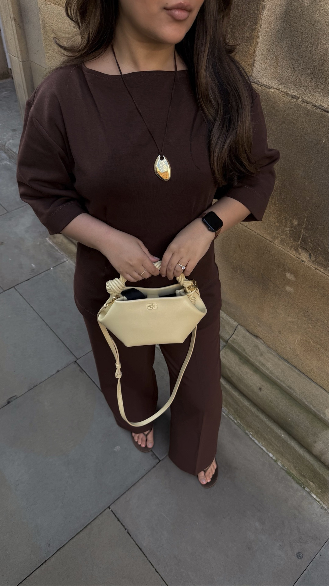 Monochrome modest Outift ideas 🤎H&M top mango tailored trousers ganni yellow bou bag

#LTKsummer #LTKspring #LTKmodest