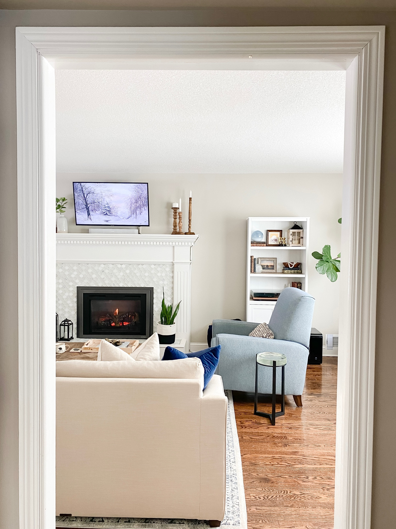 Warm cozy winter living room with fireplace