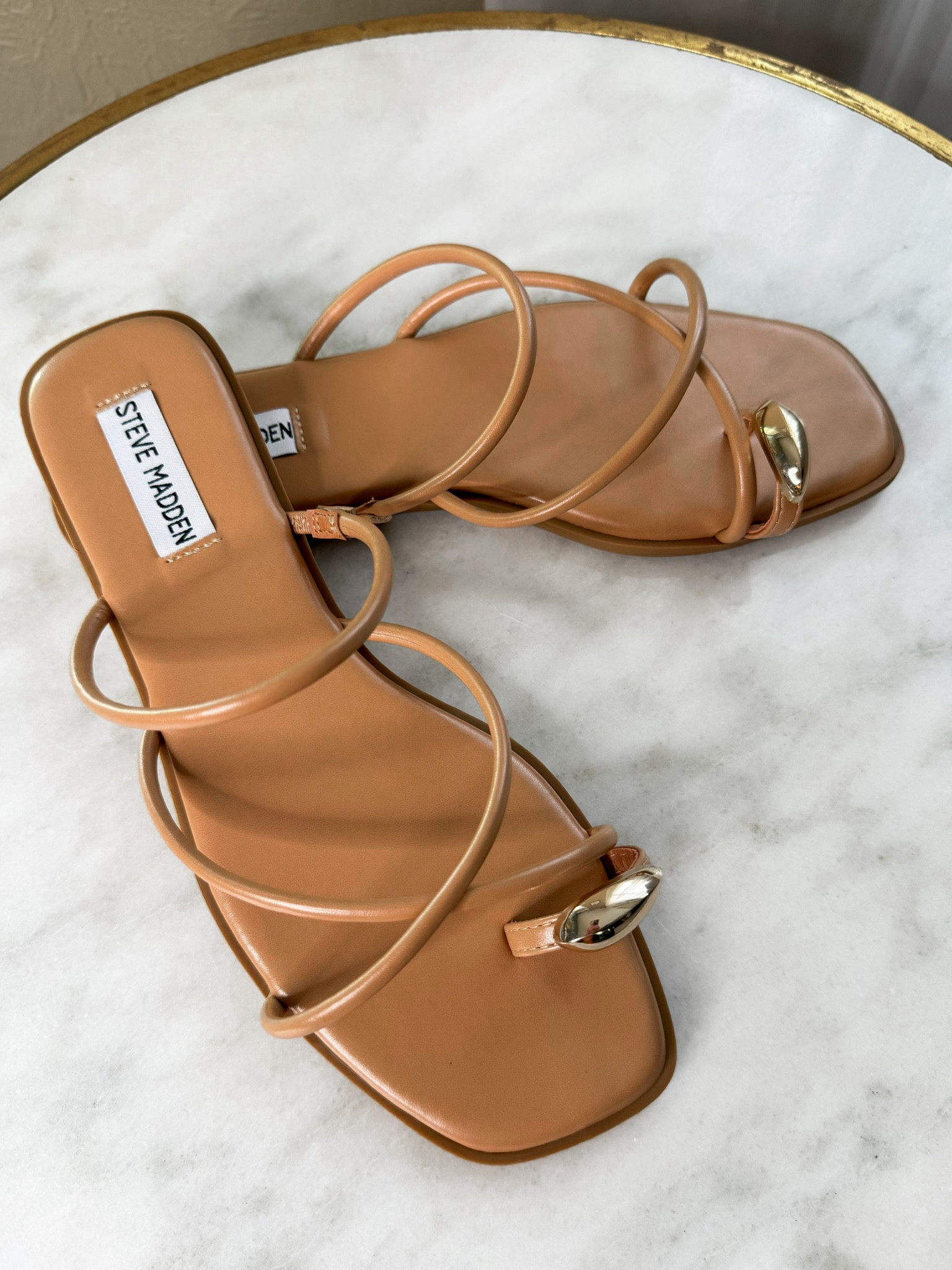 Gold toe ring sandals 

#LTKShoeCrush #LTKFindsUnder100 #LTKStyleTip