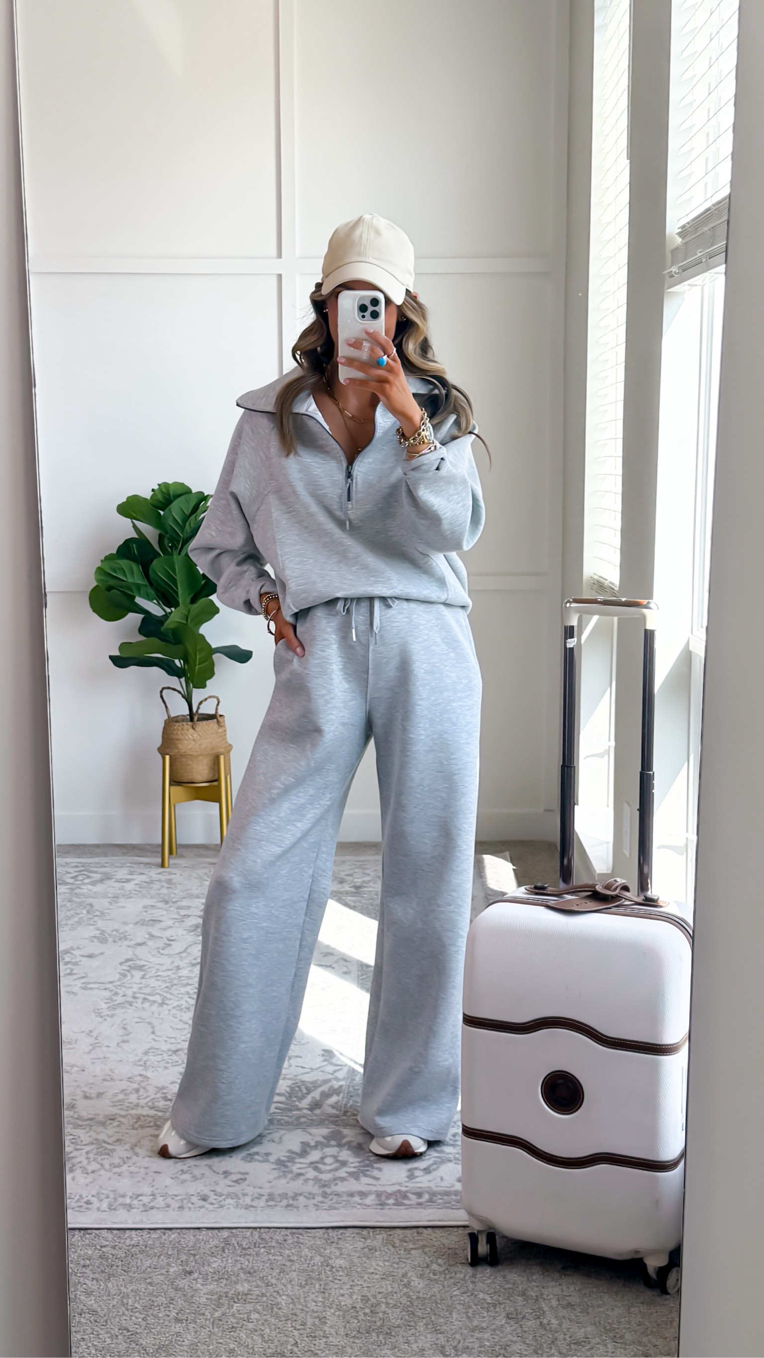 Fits true to size - I sized up to a medium for pregnancy. Pants do run a bit long, but you can fold over the waist to make shorter. 

travel set | travel outfit | fall outfits | fall | airport outfits 

#LTKSeasonal #LTKHoliday #LTKTravel