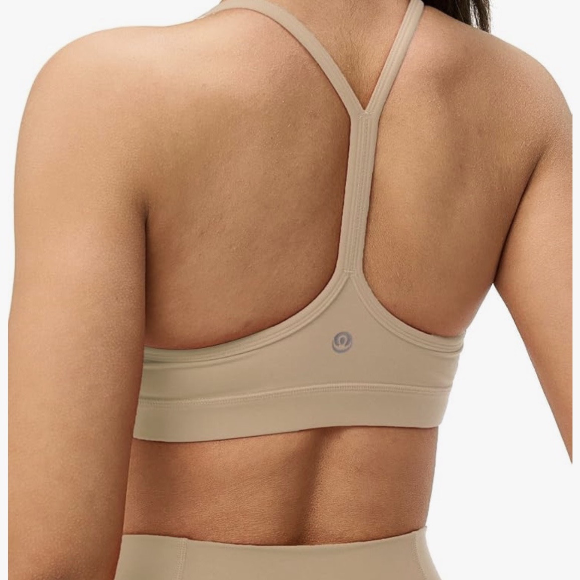 I’ve shared my favorite Target tanks twice and both times I have received quite a few messages about compatible bra option ideas. A nude/beige racer back sports bra is best under these tanks. I have shared a few that I like, but find one that’s comfortable for YOU. I would suggest ordering two or three and wearing them a couple of times before you decide. Both Amazon and Target make it easy to return if they don’t work. Part of the reason I love wearing these tank tops is that these sports bra options I have found are so comfy and effortless that I forget I even have a bra on. 😎