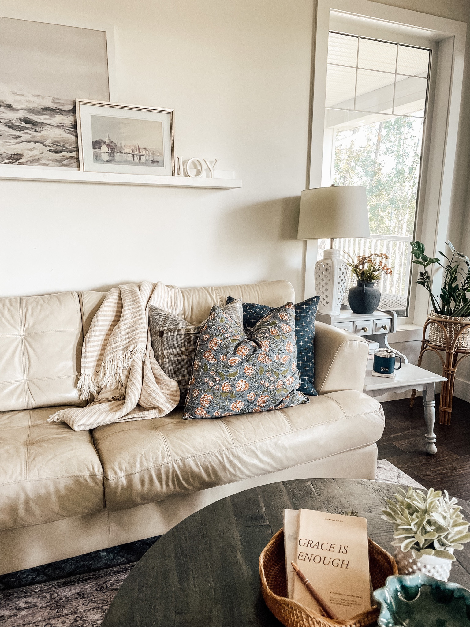 My cozy spot I like to read have coffee and read my new devotional in the mornings!  I found the floral pillow at HomeSense but I’ve linked some similar ones that are beautiful.  The plaid and navy pillows are from Amazon! I think this pillow combo has a fall vibe.  I’ve also linked the coffee table and rug.

#LTKhome #LTKSeasonal