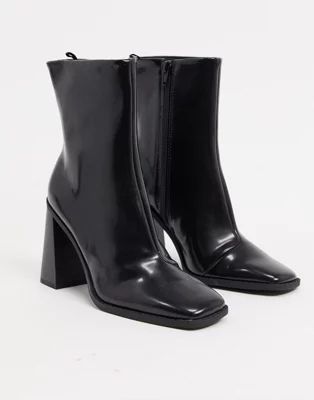 Monki Robbie vegan-friendly leather heeled boot in black | ASOS (Global)