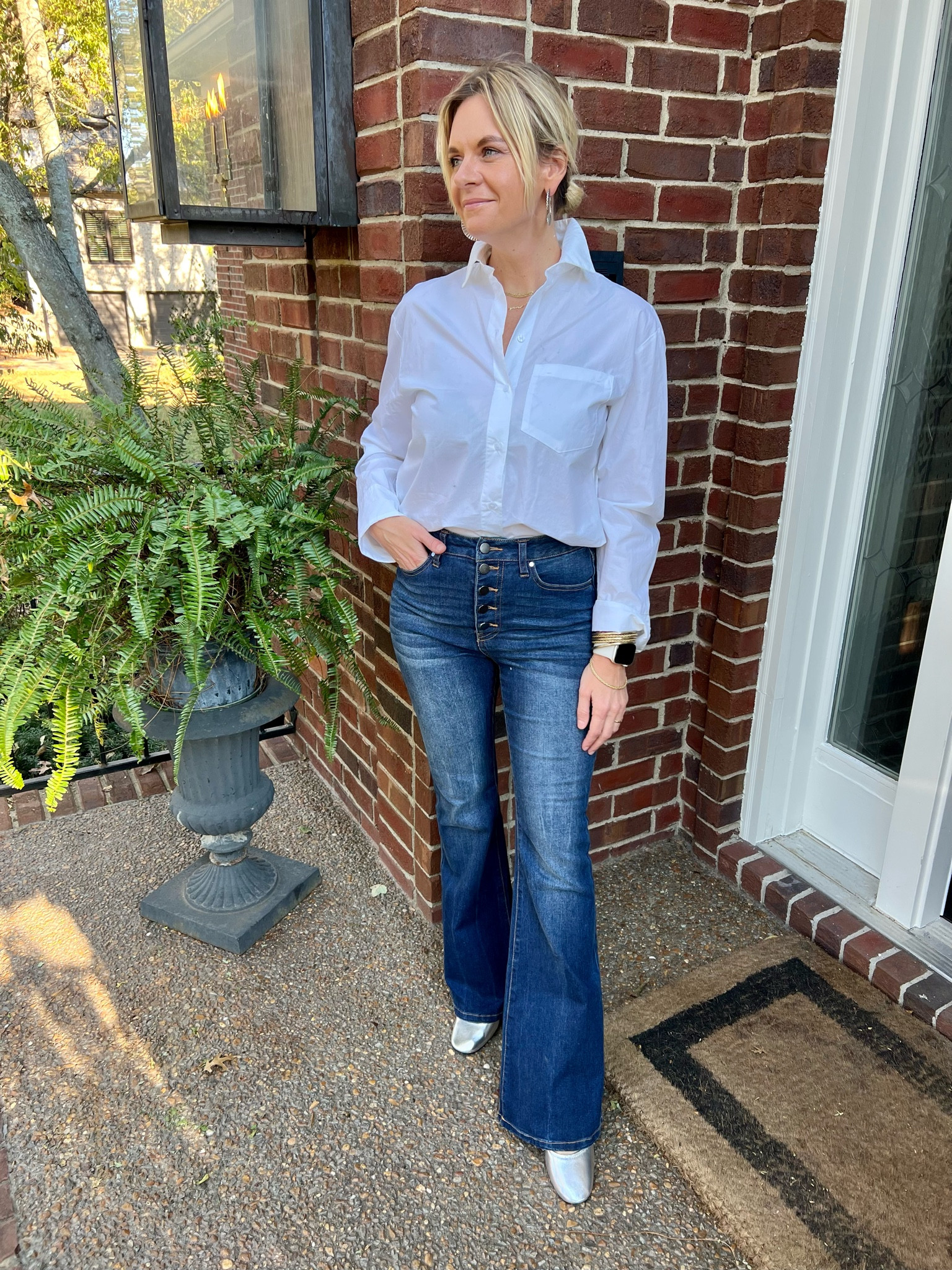 White button down + flare jeans + Silver shoes 🤍🤍🤍 

#LTKshoecrush #LTKstyletip #LTKfindsunder100