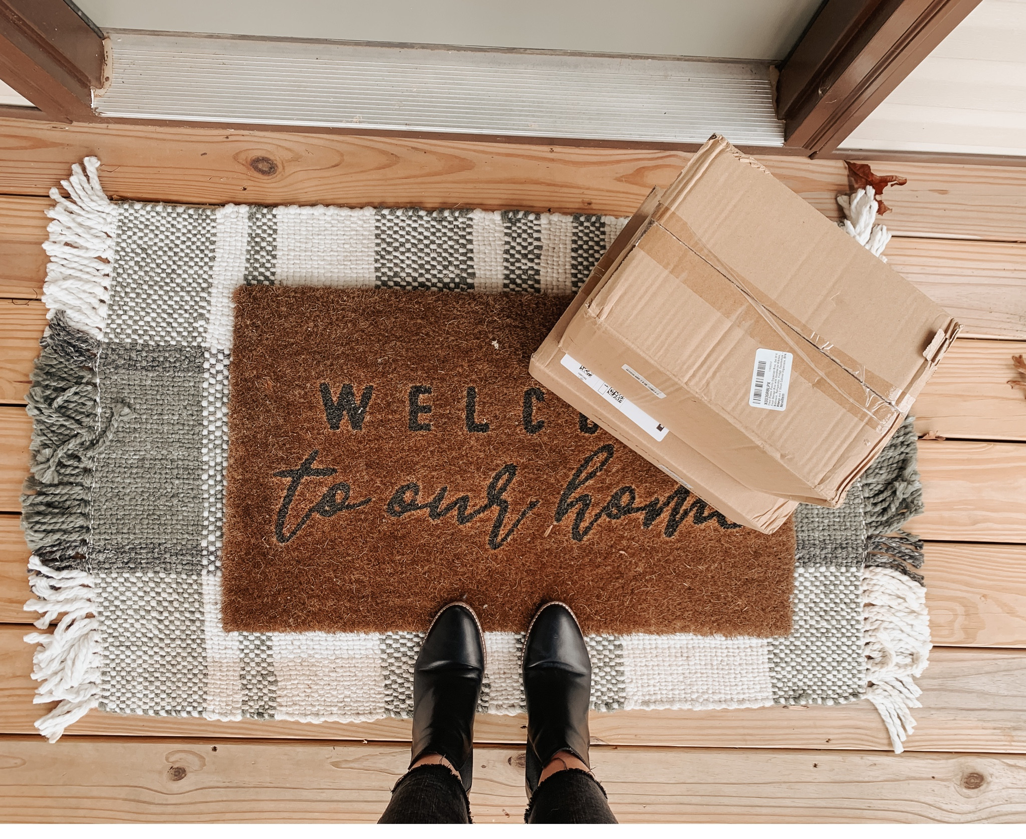Christmas presents are starting to arrive! Hooray for happy mail on the front porch | porch decor | front door mat | entry way | home decor

#LTKhome #LTKunder50 #LTKSeasonal