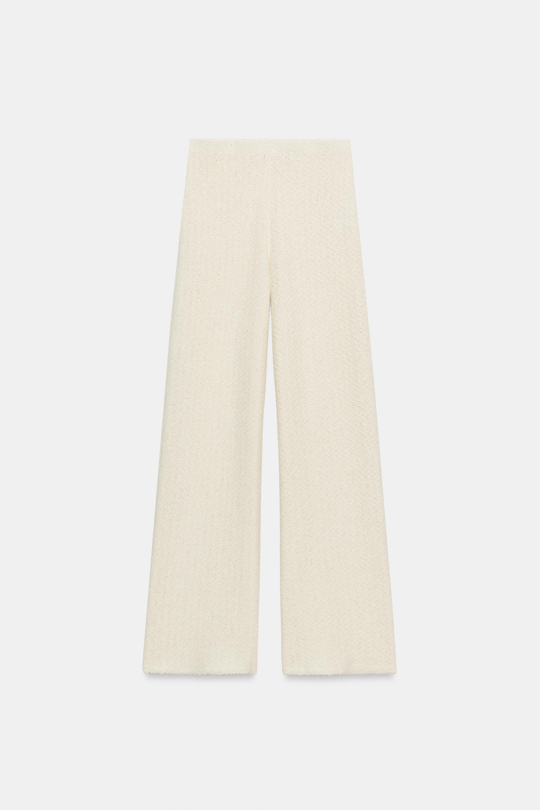 Pants made of cotton blend yarn. Mid-rise with an elastic waistband. Wide-leg cut. | Zara US