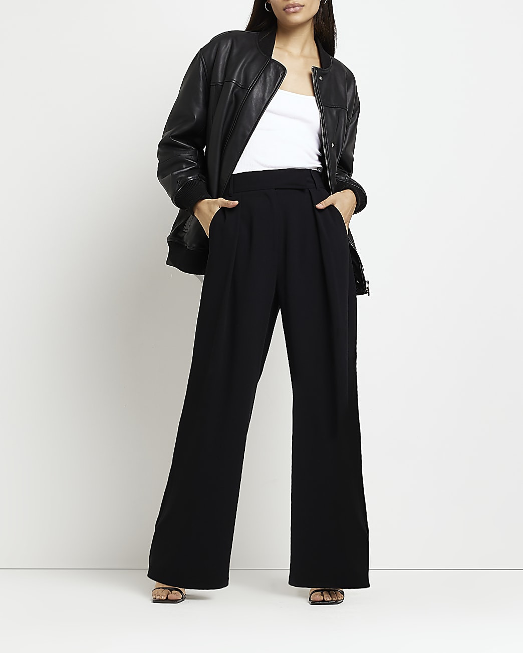 Black high waisted wide leg trousers | River Island (UK & IE)