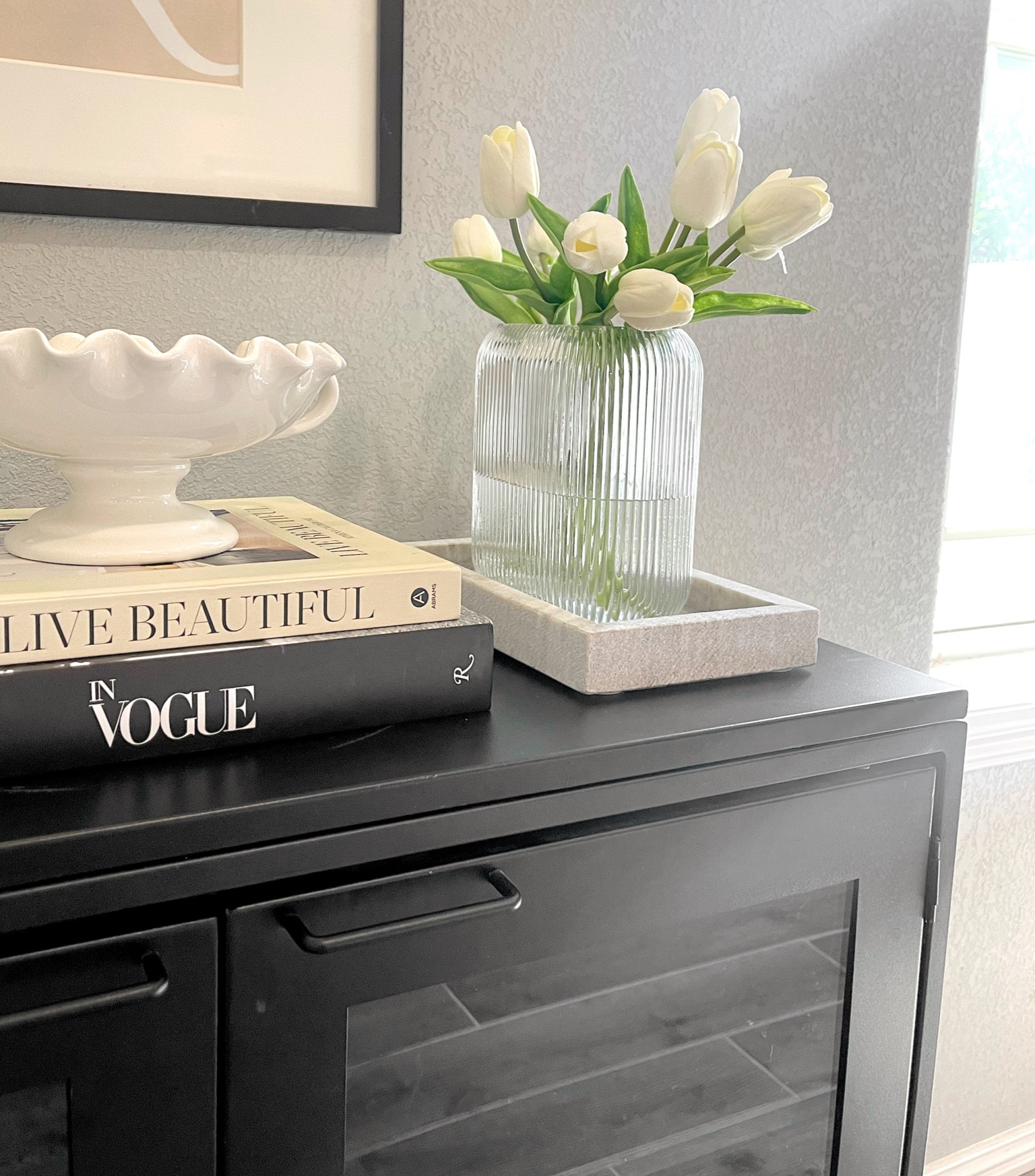 aesthetic home finds 🤍 
amazon home finds, fluted vase, amazon decor, modern flower vase, modern home finds, white flowers, coffee table books, neutral home decor 

#LTKFind #LTKstyletip #LTKhome