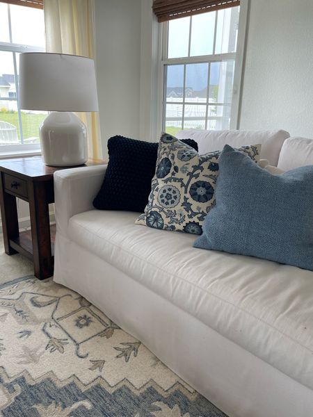 Classic blue and white living room / blue and white coastal pillows/ blue and white livi kg room decor / coastal blue pillows/ pottery barn blue pillows / wool blue and ivory rug/ Ralph Lauren wool rug/ coastal living room / pottery barn living room / pottery barn pillows 

#LTKhome #LTKsalealert #LTKunder100
