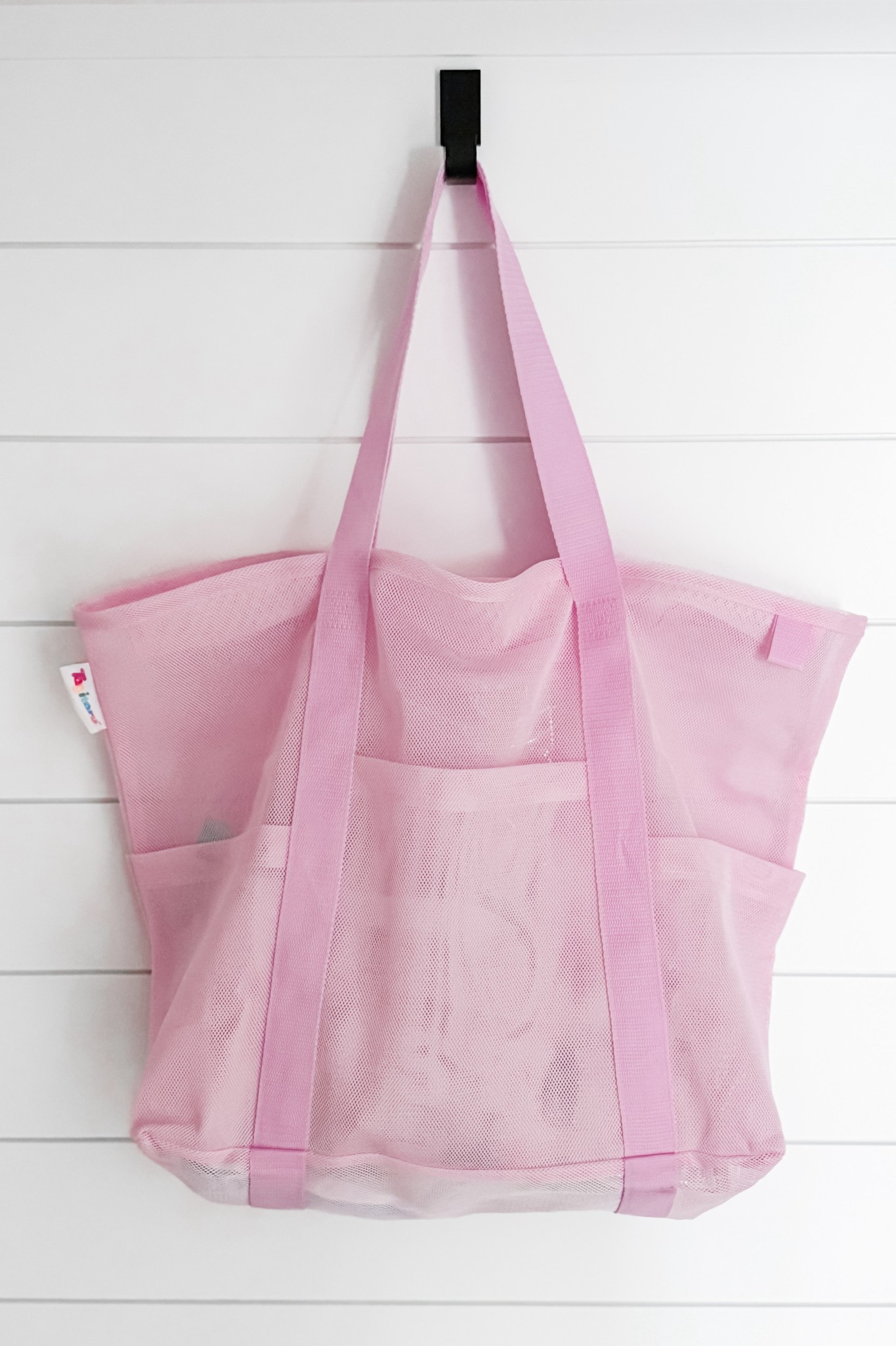 I feel like I have a bag for *everything* these days, but it sure does make life easier when you don’t have to fully swap the contents of your bags for every activity! 

This mesh pool tote is HUGE and incredibly roomy (measuring 15.3 inches x 7.87 inches x 17.3 inches) with exterior mesh pockets and a zippered, clear, waterproof interior pocket for important items. I also appreciate the long, sturdy handles and the double zipper top!

This bag could totally be used for the beach too, but we don’t get much beach time in the PNW. 😉 But I’ll be sure to pack it for our next vacation!

#LTKFamily #LTKKids