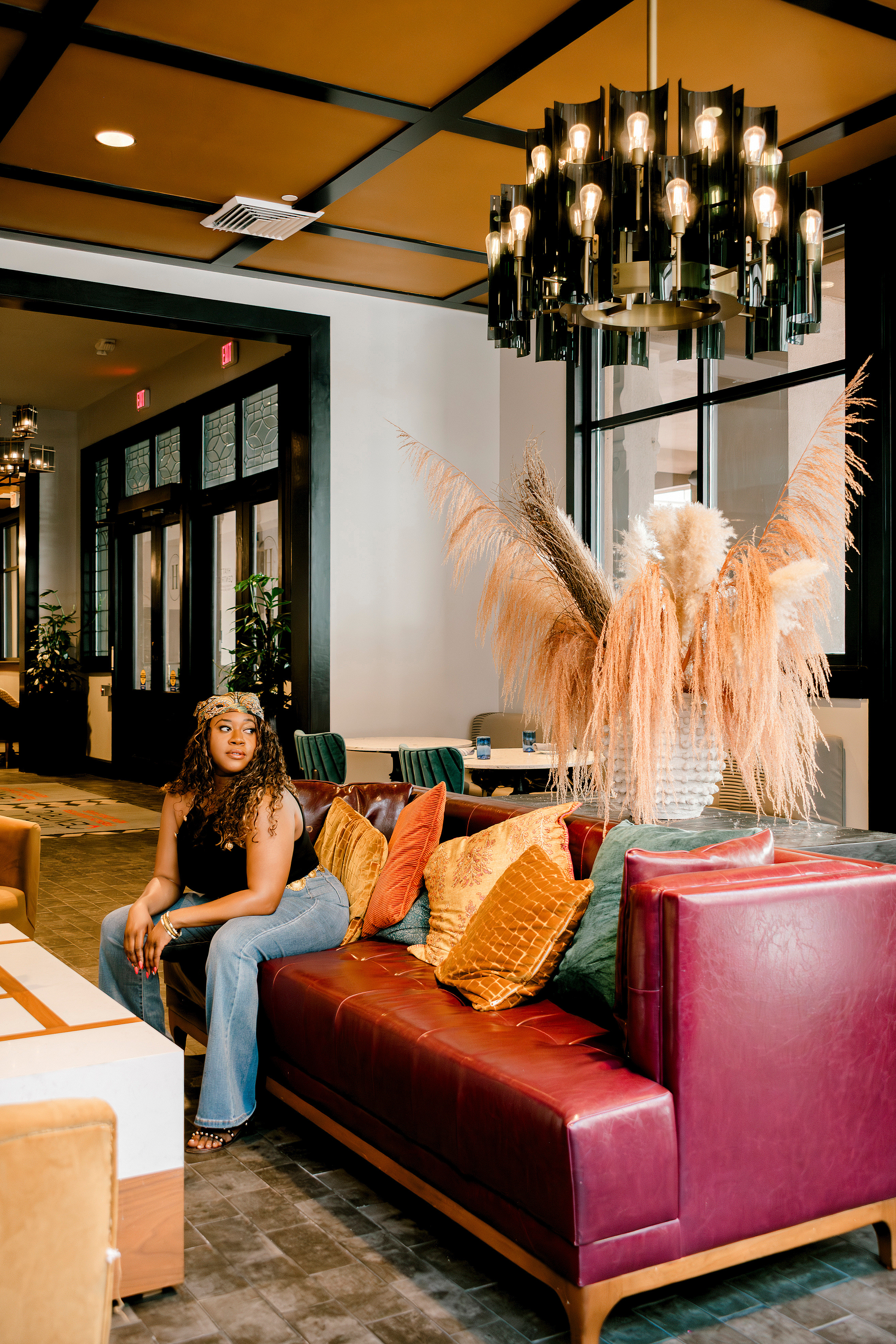 Casual glam done right. This ribbed black tank with gold buttons pairs perfectly with high-waisted flares and a paisley head scarf for that effortlessly polished look. Chic, comfortable, and easy to recreate! #FlaredJeans #BlackTankOutfit #ModernBoho #LaVieDeLaFête  

 #LTKSeasonal #LTKStyleTip #LTKTravel