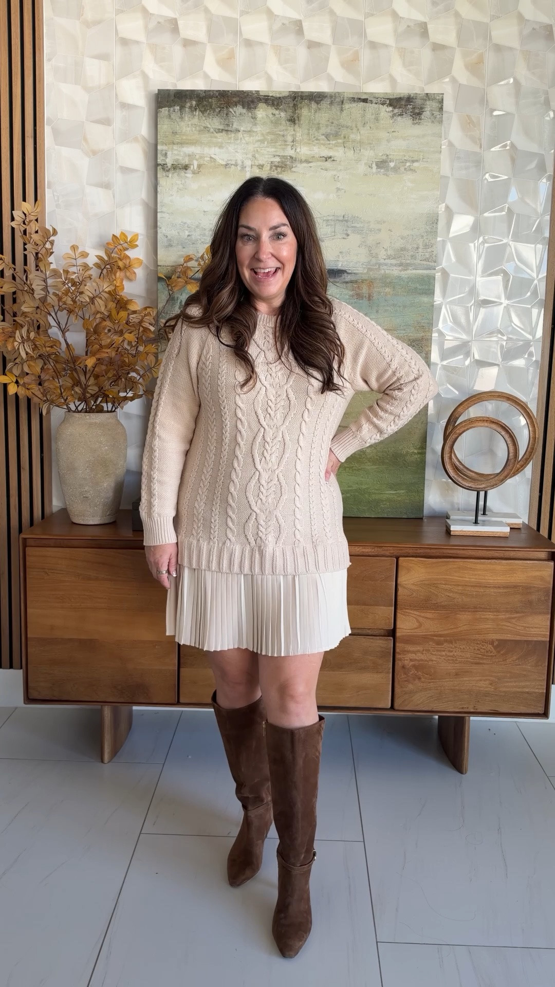 Cream cable knit sweater dress 🍂 The pleated hem makes it so fun and flirty! Paired it with knee-high suede boots for the perfect cozy fall look 🤍

Sizing: Dress tts, L