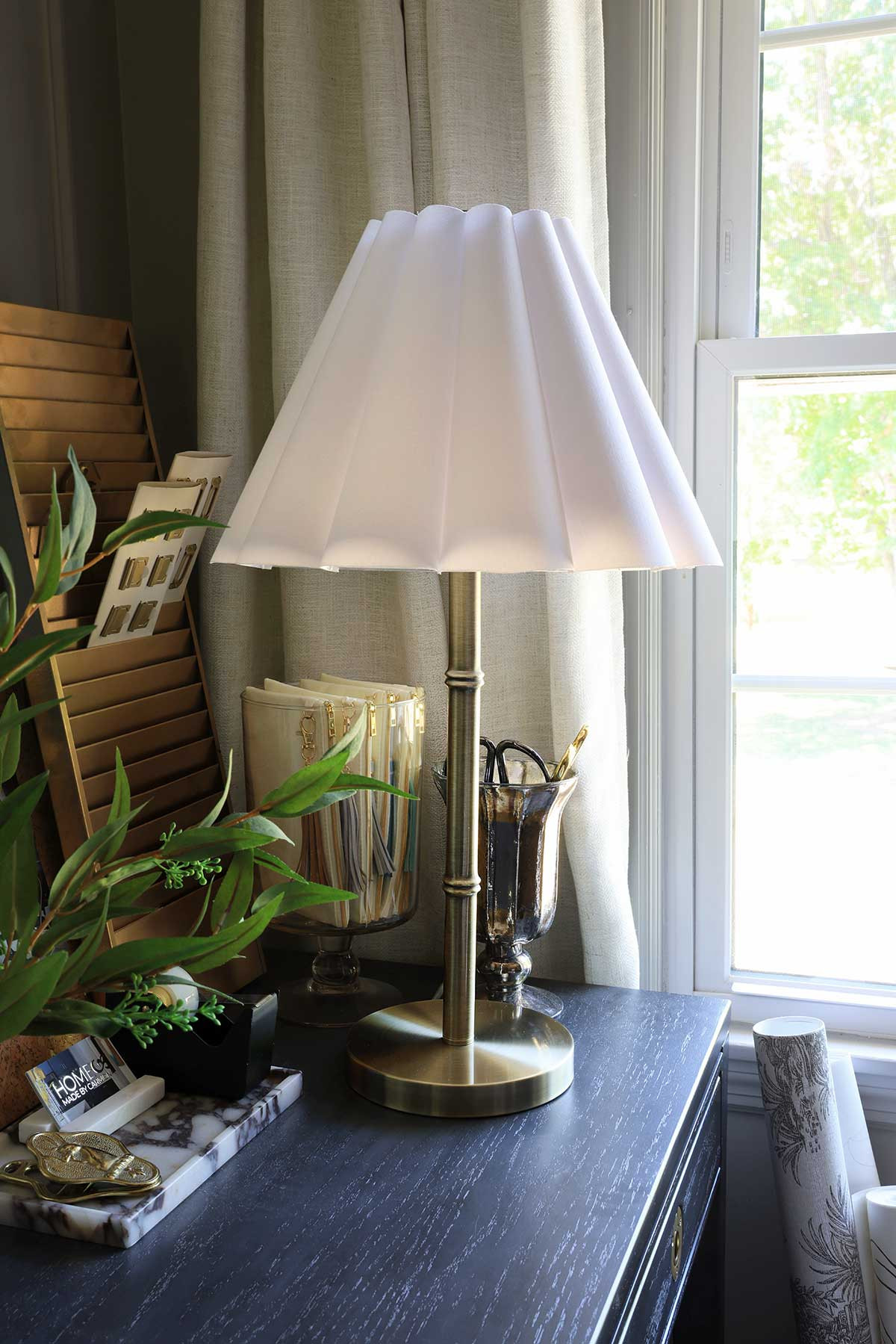 Pretty brass table lamp with a scallop shade. Beautiful large console lamp that would be perfect on a kids bedside table, or as two lights for an entryway console.  

 #LTKHome
