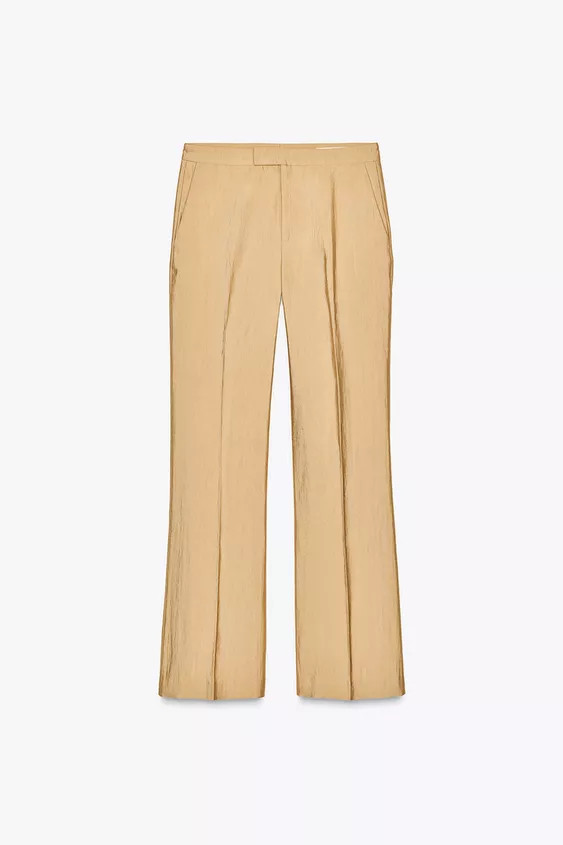 ZARA WOMAN COLLECTION Mid-rise pants made of viscose yarn. Side pockets. Front crease detail. Fro... | Zara US