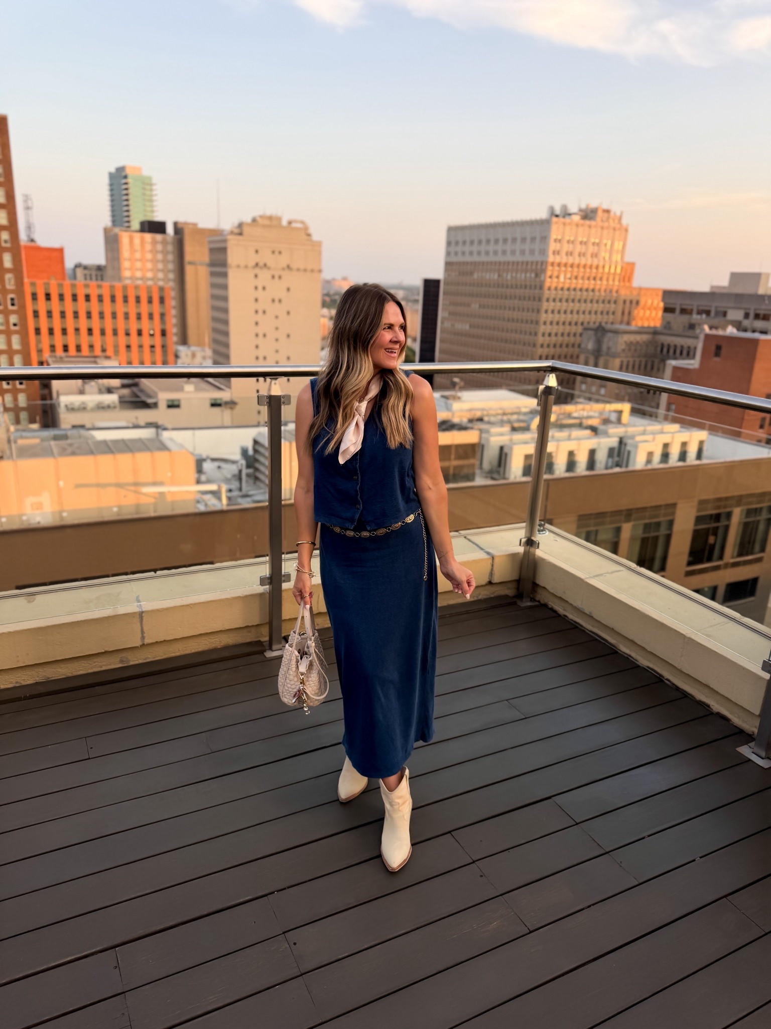 What I wore to a rooftop dinner in downtown Fortworth. Wearing a medium in both vest and skirt. My boots are old and I’ll link similar. 

#LTKFestival #LTKootd #LTKOver40