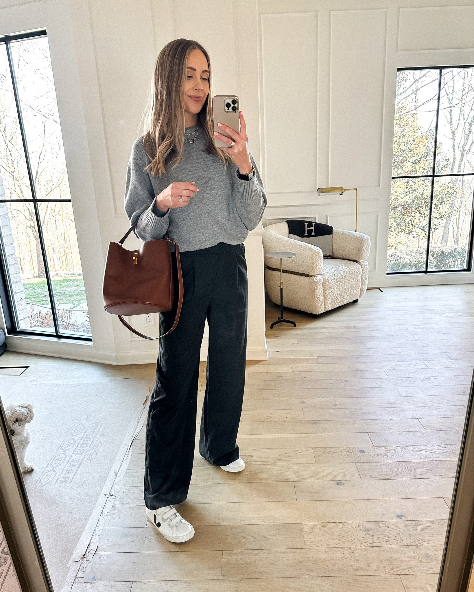 Fashion Jackson wearing grey sweater (small), grey trousers, Celine bucket bag, sneakers, veja #fashionjackson #sneakers 

#LTKstyletip #LTKshoecrush #LTKunder100