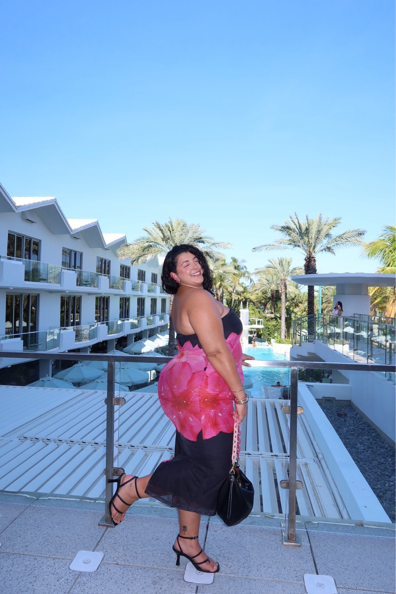 🌺 Vacation outfit, but make it curve-friendly 🌺

This floral midi dress is one of those pieces that turns heads the second you walk into the room. The bold pink floral print, flattering silhouette, and elevated accessories make it the perfect plus size vacation outfit, wedding guest dress, date night look, or resort wear moment.

Linked my exact dress, heels, and handbag 🖤✨

#LTKcurves #PlusSizeFashion #PlusSizeStyle #CurvyFashion #VacationOutfit #ResortWear #WeddingGuestDress #DateNightOutfit #FloralDress #MidiDress #SummerStyle #VacationStyle #CurvyGirlFashion #BodyConfidence #PlusSizeInfluencer #MiamiStyle #Eloquii #CurveModel #FashionOver30 #LuxuryStyle

#LTKPlusSize #LTKdayinmylife #LTKootd