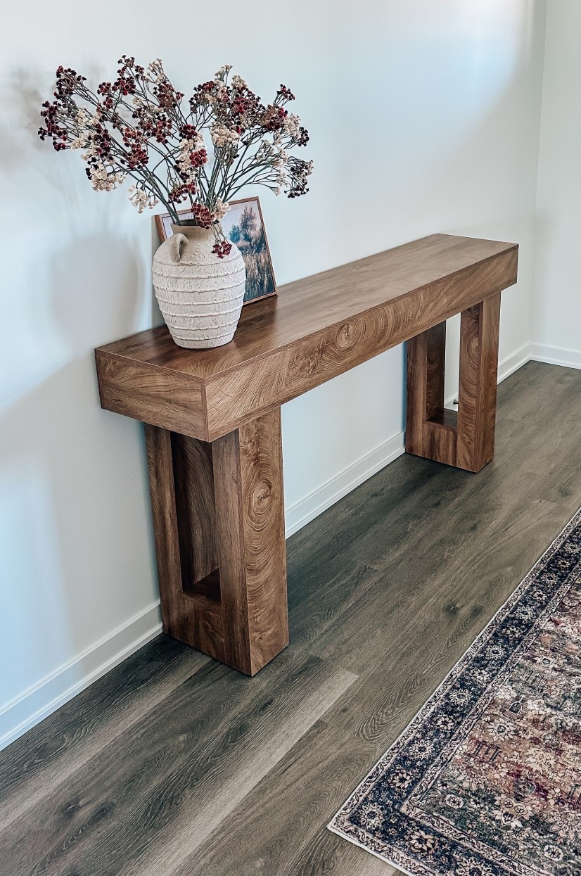 Wow!!! This entry way table exceeded all of my expectations and added the perfect touch to our home. It is BEAUTIFUL. Perfect color and perfect size. I love it!!! Color is light brown 

#LTKStyleTip #LTKFallSale #LTKHome
