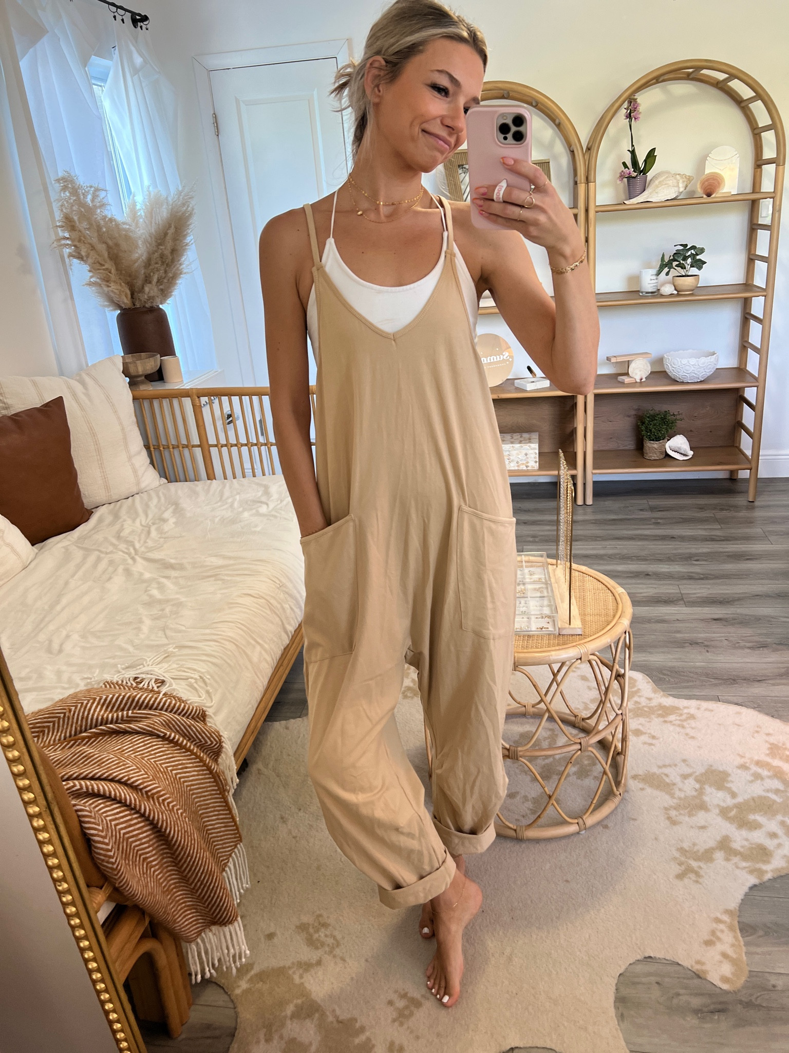 This free people jumpsuit dupe is my new favorite favorite. Got it in another color too cause I knew it’d be a win! True to size. Wearing a small. Khaki color with white bungee tank under  

#LTKFind #LTKstyletip #LTKunder50