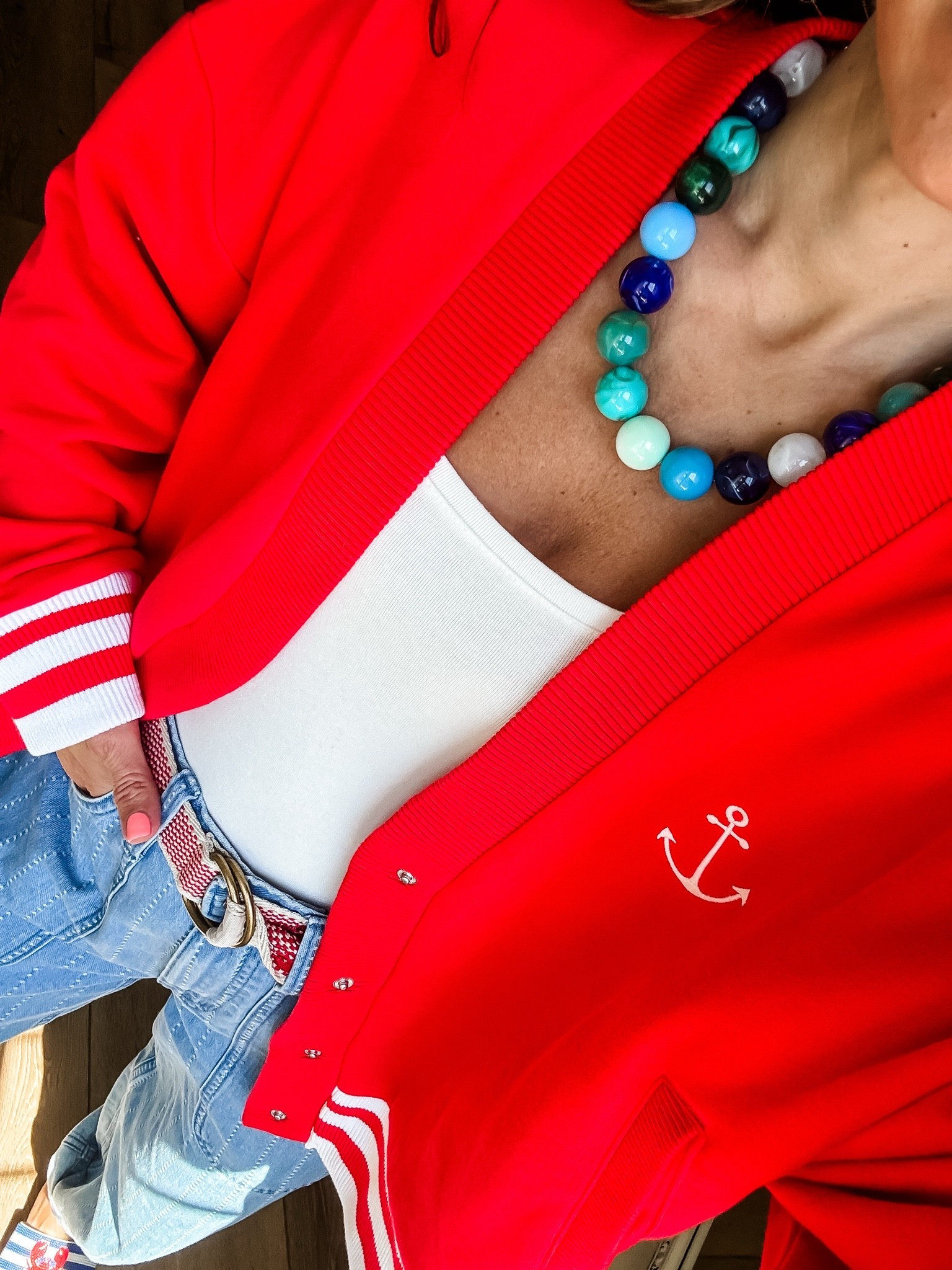 Small cardigan sweatshirt. Target style.
Beaded necklace

#LTKOver40