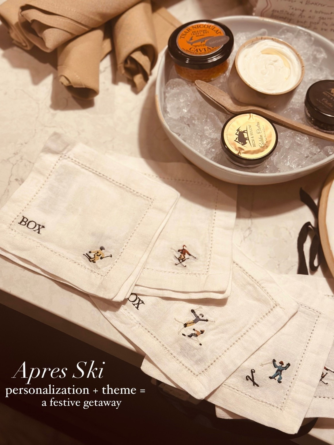 Bringing a little personal touch to après always makes it feel more festive. These custom napkins pack flat but add the biggest impact.