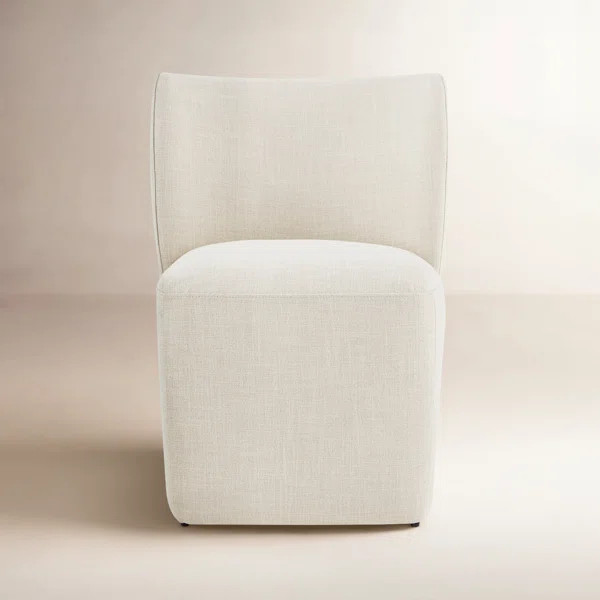 Madie Upholstered Dining Chair with Casters | Wayfair North America