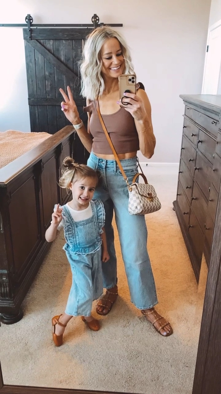 Love love love these Walmart goodies! Teegan’s wearing a Walmart romper and I’m obsessed with these Walmart jeans!! They also have a great dupe for my LV Croisette! 🤍
I also have this Amazon ruffle crop for $10, in 3 colors! Both of these outfits are such a bargain and so fun to coordinate with your mini me.

#LTKunder50 #LTKkids #LTKstyletip