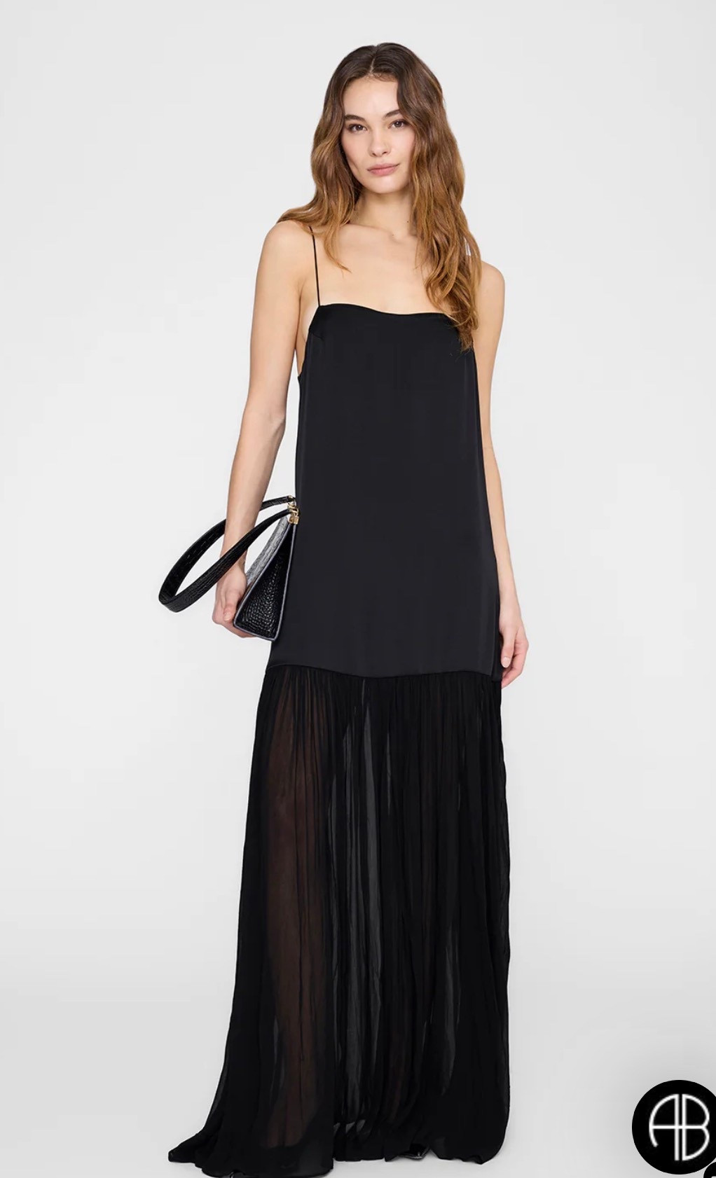The Anine Bing Clementine Dress is the definition of understated luxury.

This black maxi dress features a sleek slip-style bodice with a soft, sheer pleated skirt that moves effortlessly — creating that minimalist, elevated silhouette that feels both modern and timeless.

Perfect for evening outfits, date nights, events, or vacation dinners, this dress gives that quiet confidence energy without trying too hard.

Style it with a sleek clutch and minimal heels for a chic, all-black outfit that always feels expensive.

#LTKWedding #LTKgrwm #LTKdayinmylife