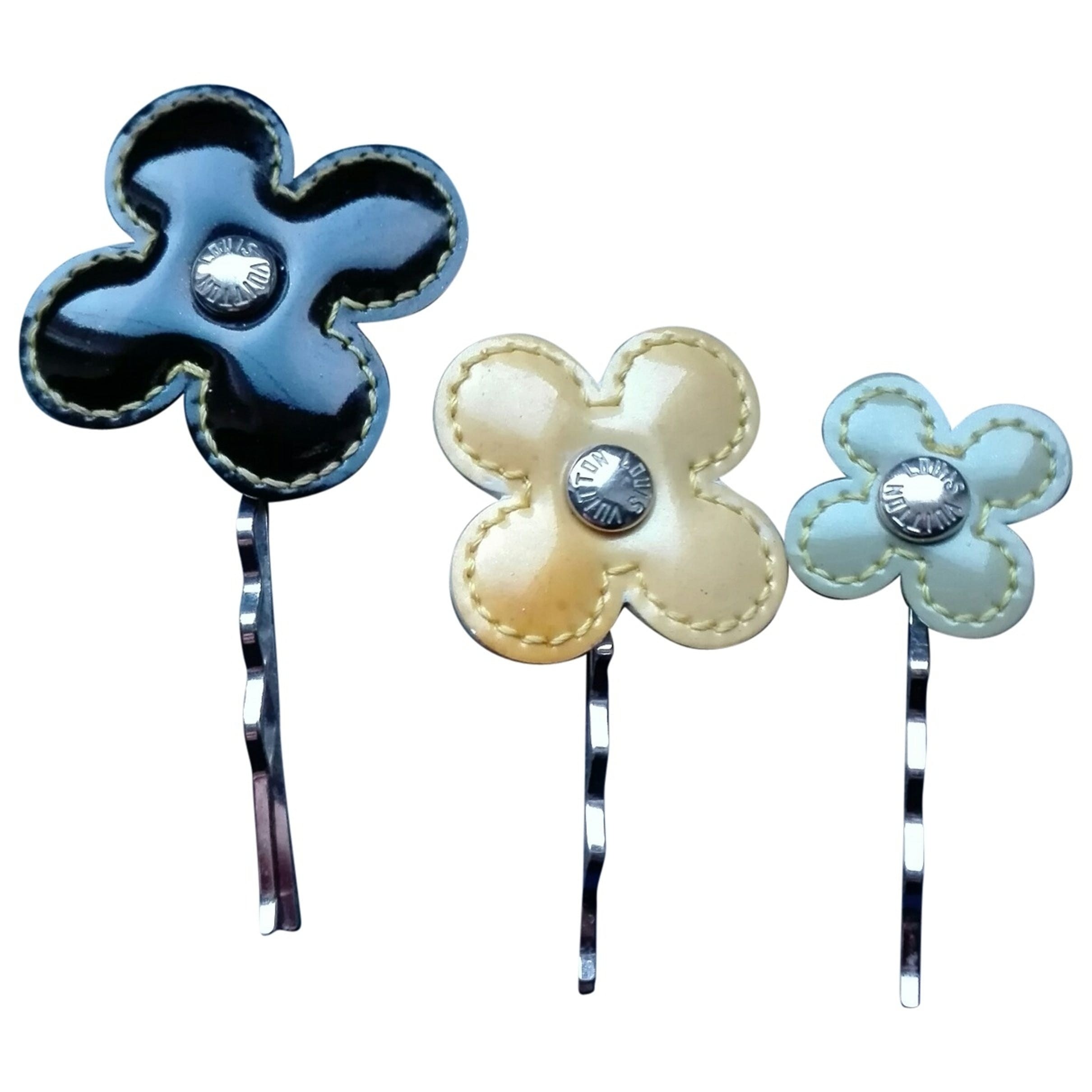 Monogram leather hair accessory 3 | Vestiaire Collective US