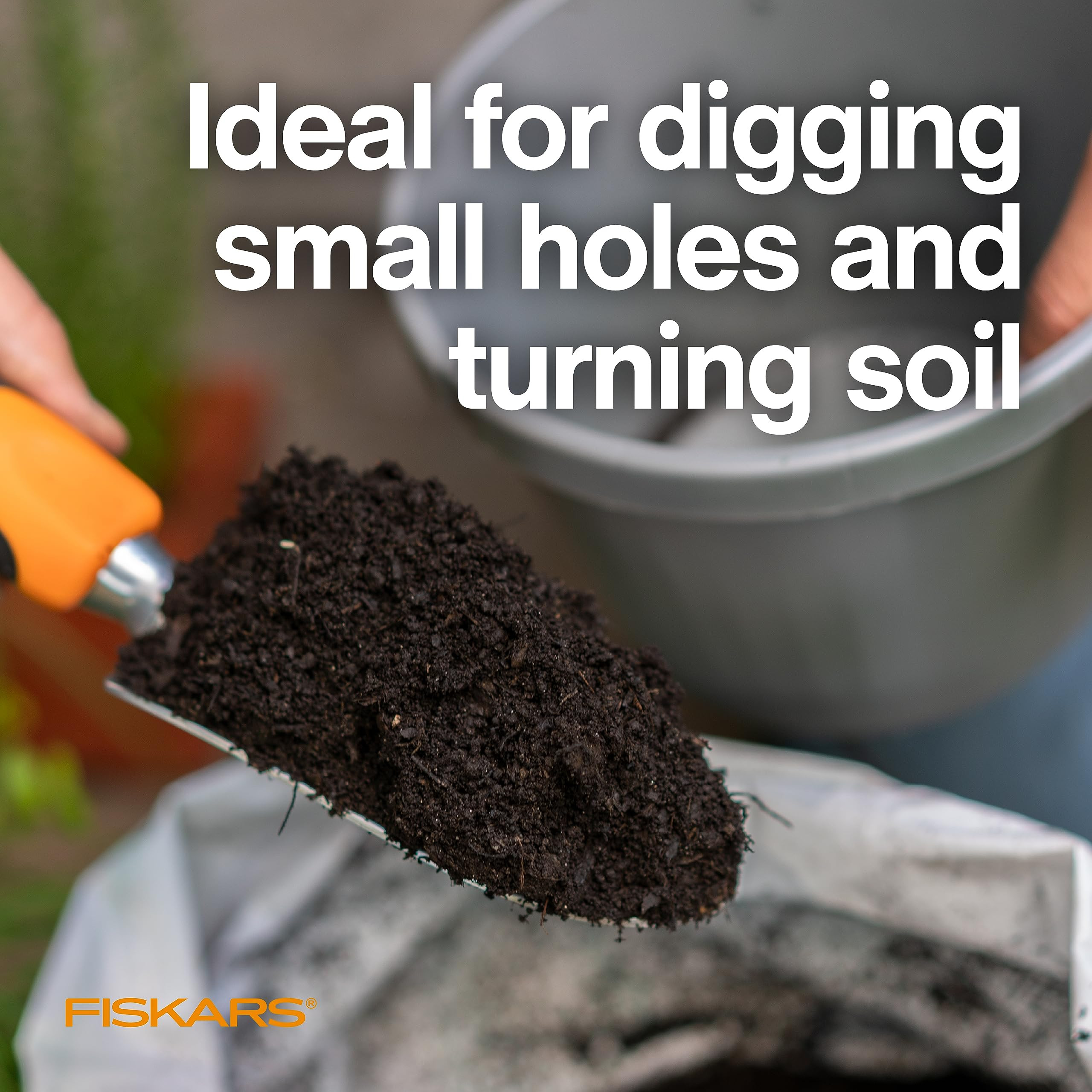 Fiskars Ergo Garden Trowel for Digging and Planting, Heavy Duty Gardening Hand Tool with Hanging ... | Amazon (US)