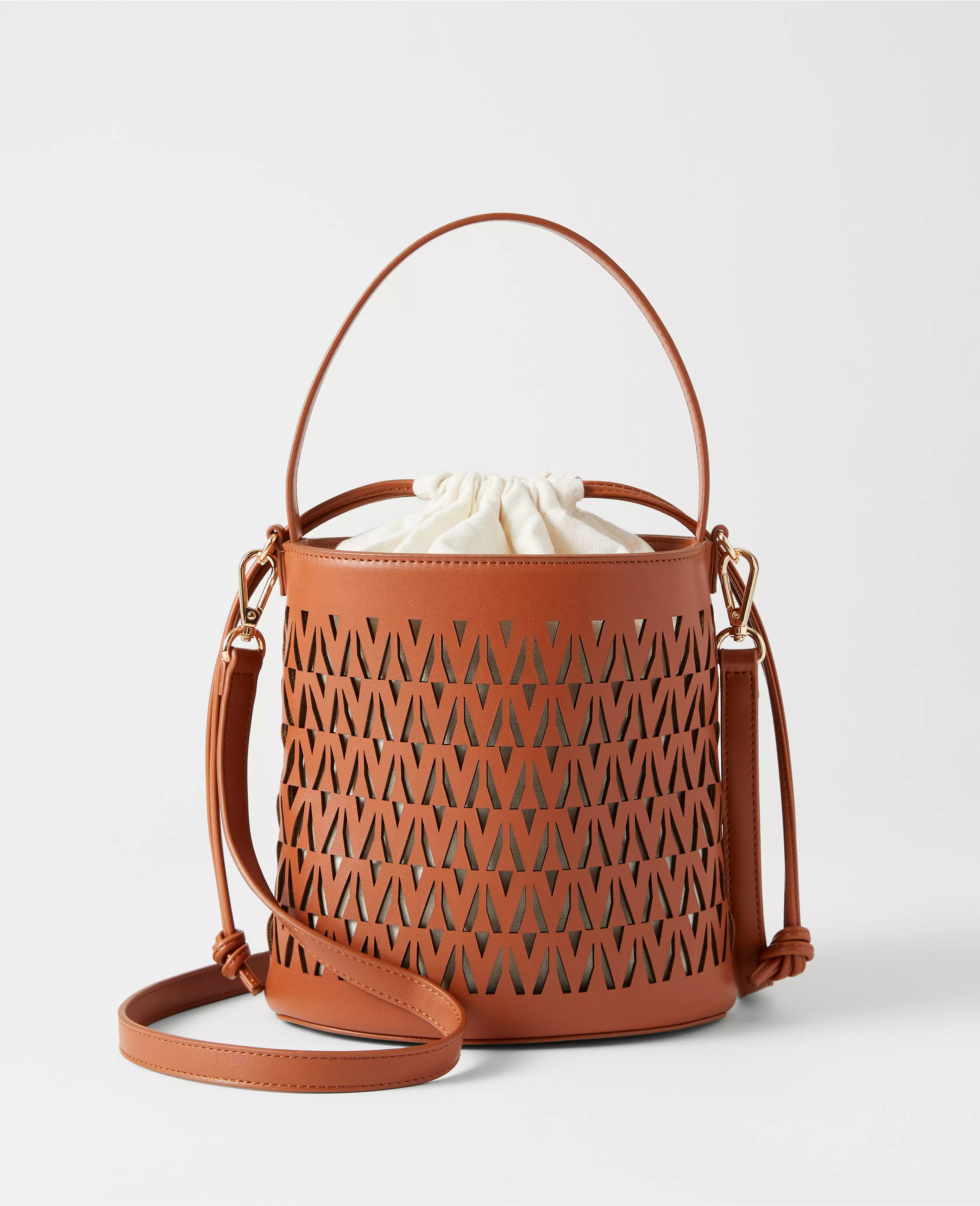 Weekend Collection Perforated Crossbody Bucket Bag | Ann Taylor