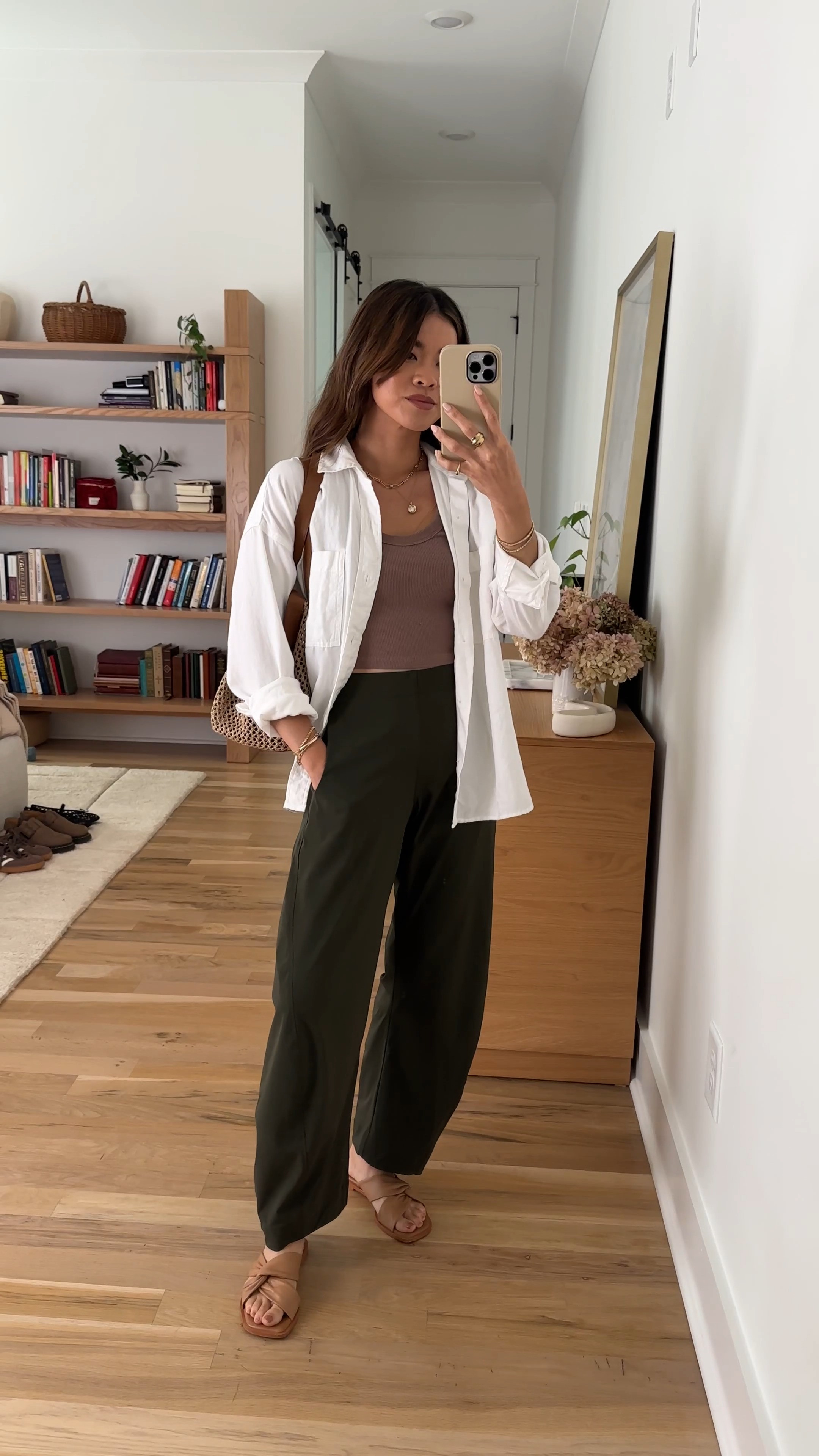 I love a button up to throw on over anything! This @Vuori US one is so nice.

Sizing info: 
-Ruti The On The Loose Work Pants (Size 0 regular in Verdant) 
-Abercrombie Bra Free Tank (Size XS) 
-Vuori Trestles Twill Button Up (Size XS in White)

green pants, petite pants, green petite pants, fall pants, summer pants, barrel pants, summer outfit, fall outfit, vacation outfit, travel outfit, best petite pants, petite barrel pants, comfy pants, viral barrel pants, fall style, petite fall style

#LTKootd #LTKSeasonal #LTKPetite