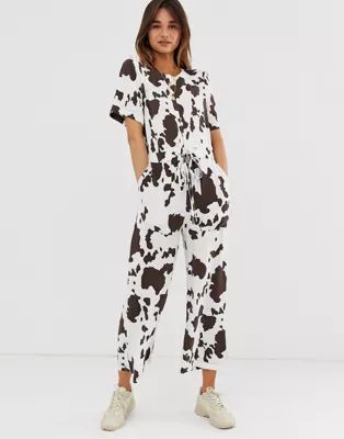 ASOS DESIGN contrast stitch t-shirt jumpsuit in cow animal print | ASOS US