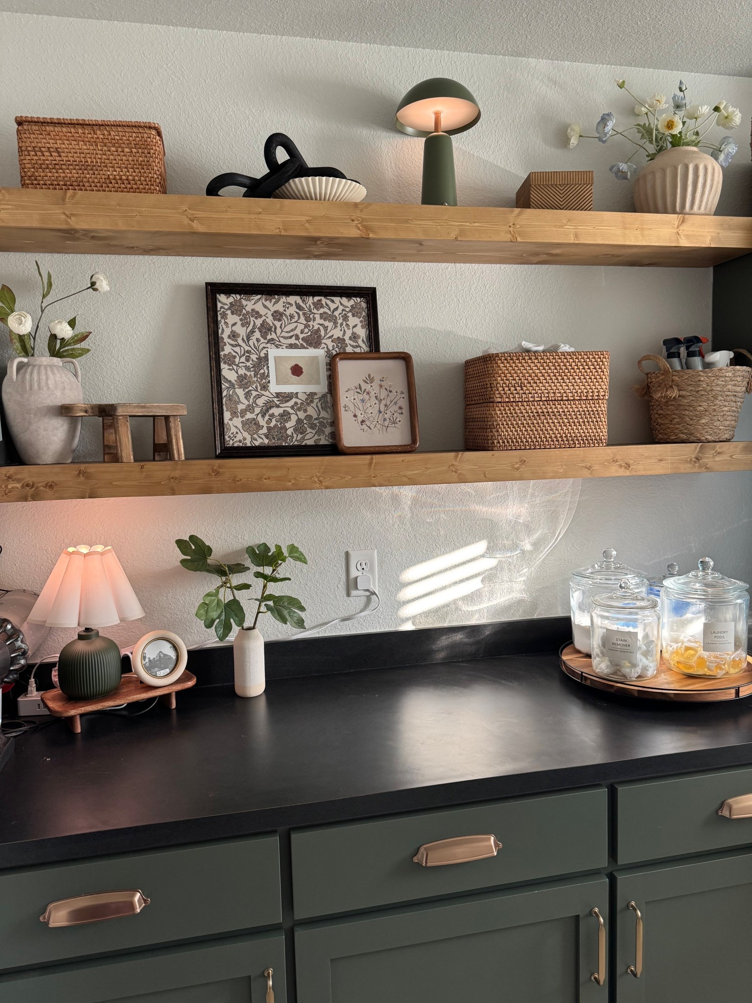 Styling floating shelves!! Our utility room was boring before adding these + some paint & new hardware. I’m loving the vibe now 🥹 maybe it’ll make me wanna finish a load of laundry faster than 3 days?! 

Open shelving decor styling shelves laundry room decor target Walmart home decor happy home sale finds 