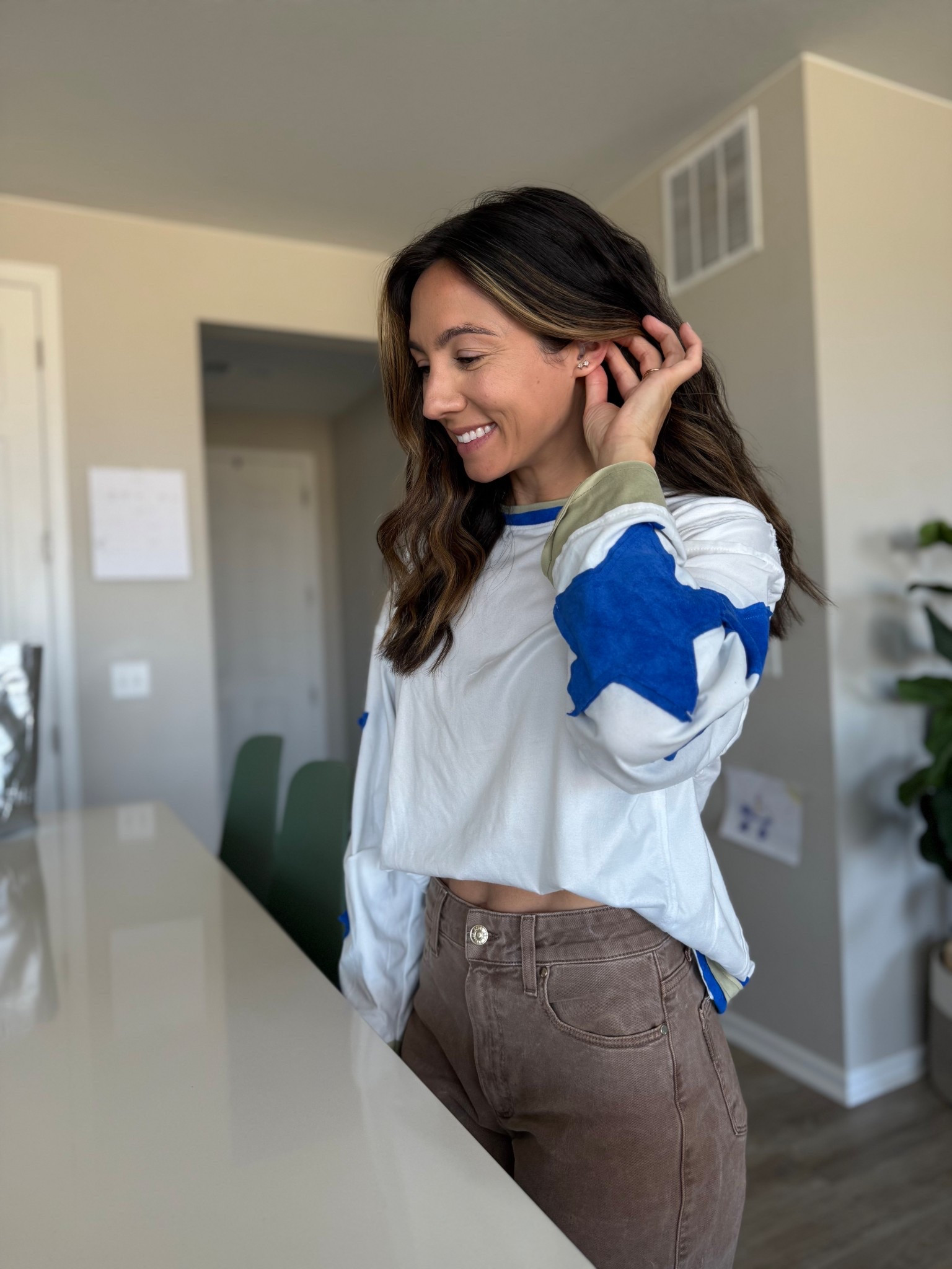 Oversized star graphic top from amazing and distressed wide leg bottoms from Paige 