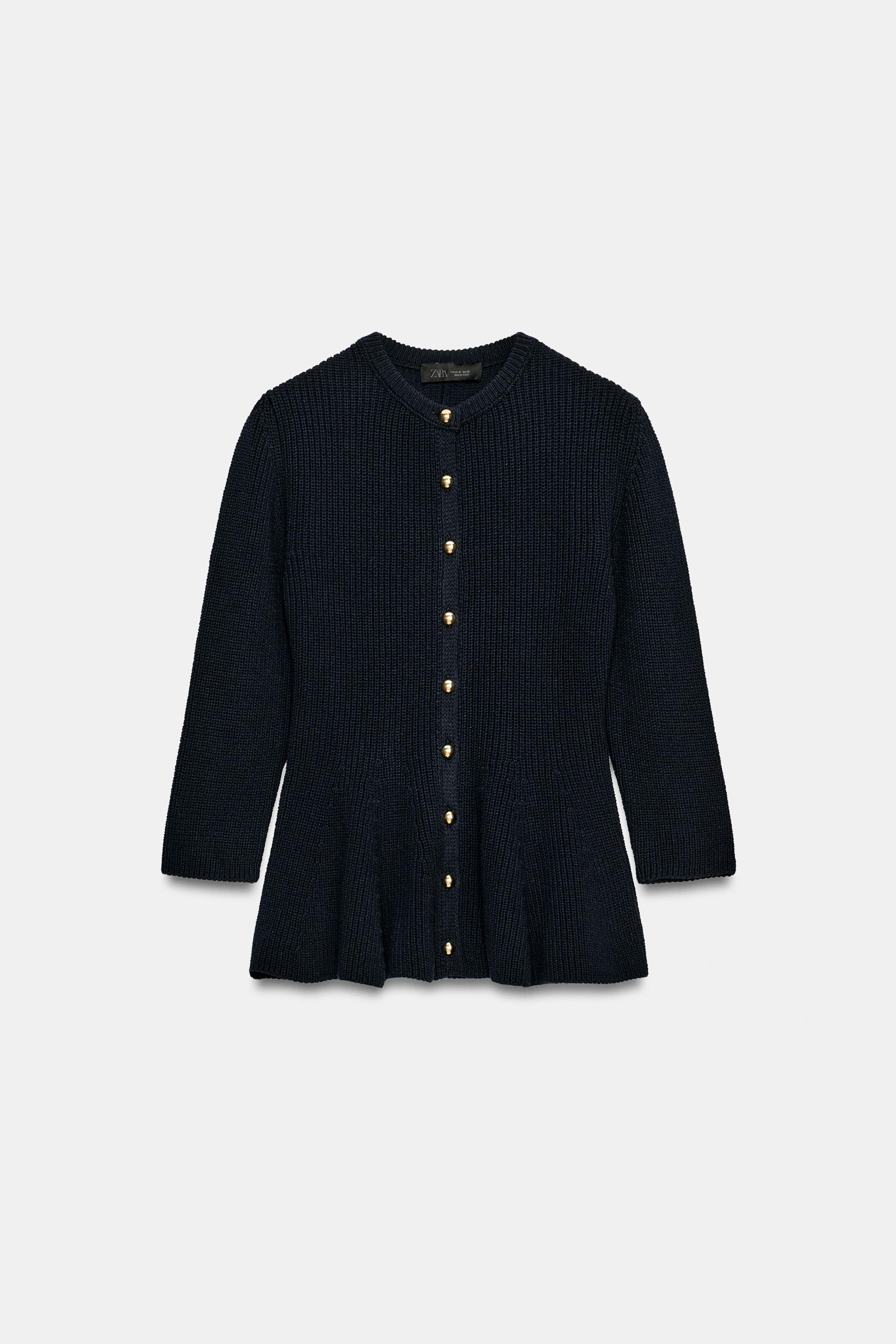 Crew neck jacket with below-elbow length sleeves. Features a flared hem and front button closure. | Zara US