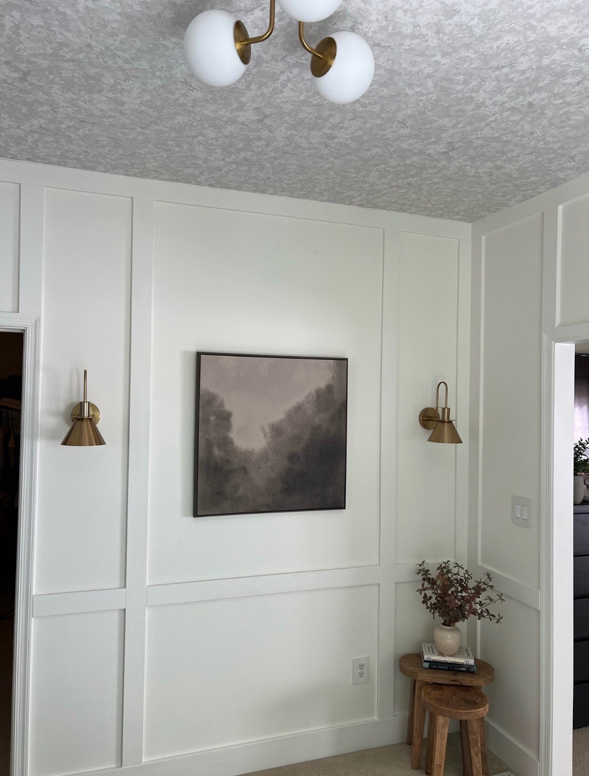 My favorite feature of our sitting room renovation (right off our primary bedroom) is these battery operated wall sconces! They are so easy to install and look very high-end. And I’ve been dreaming of wallpapering a ceiling for so long and love how it turned out! 

Primary bedroom design / wallpapered ceiling / DIY wood grid accent wall / easy DIY / white paint color 

#LTKHome #LTKSaleAlert