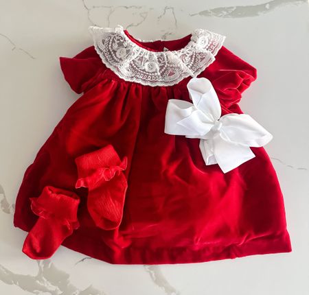 Christmas outfit for baby girl with red dress and red ruffled socks paired with a white bow! I love the collar of the dress 

#LTKstyletip #LTKbaby