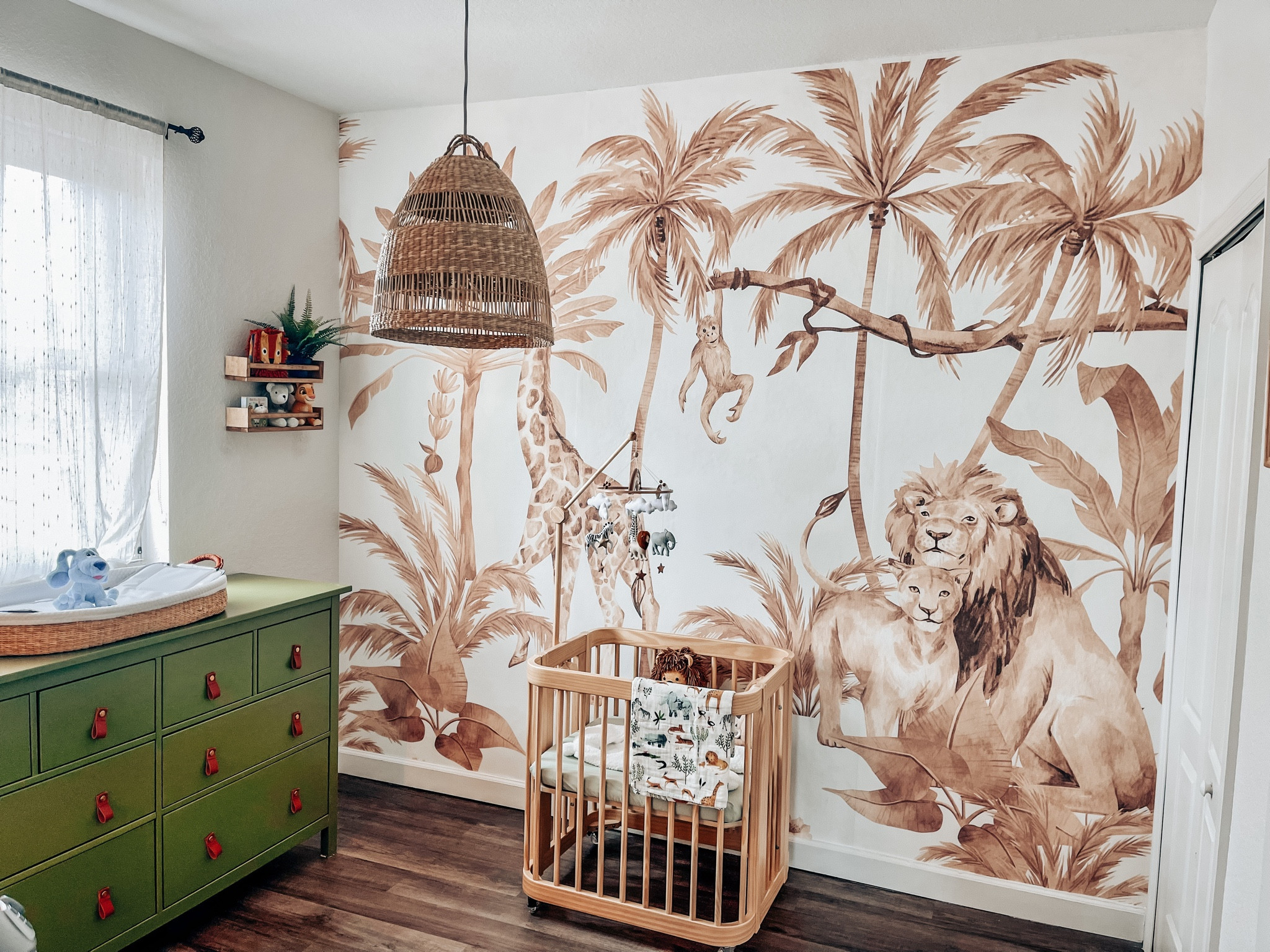 Our safari inspired Nursery for our baby boy is almost ready 🥰🦁🌴 Take a look! 

Here are some of the links of the products I used. Others are similar just for inspo purpose 🥰

Actual crib: Nestig
Actual wallpaper: Wall In Vogue (Miami)
Drawer: Hemnes Drawer (we painted it green and changed the hardware for the leather ones linked!)

#babyboy #nursery #nurseryinspo

#LTKbaby #LTKbump
