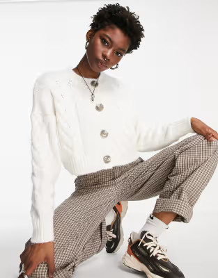 Noisy May cable knit cropped cardigan in cream | ASOS (Global)