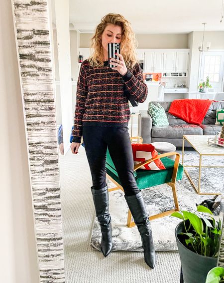 A subtle holiday sweater (complete with a tinsel stripe), classic black Minnie trousers, and tall black boots  

#LTKshoecrush #LTKstyletip #LTKHoliday