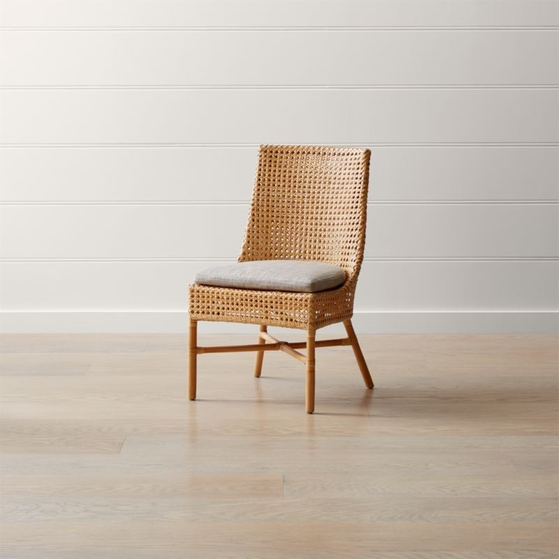 Maluku Natural Rattan Dining Side Chair and Cushion | Crate & Barrel | Crate & Barrel