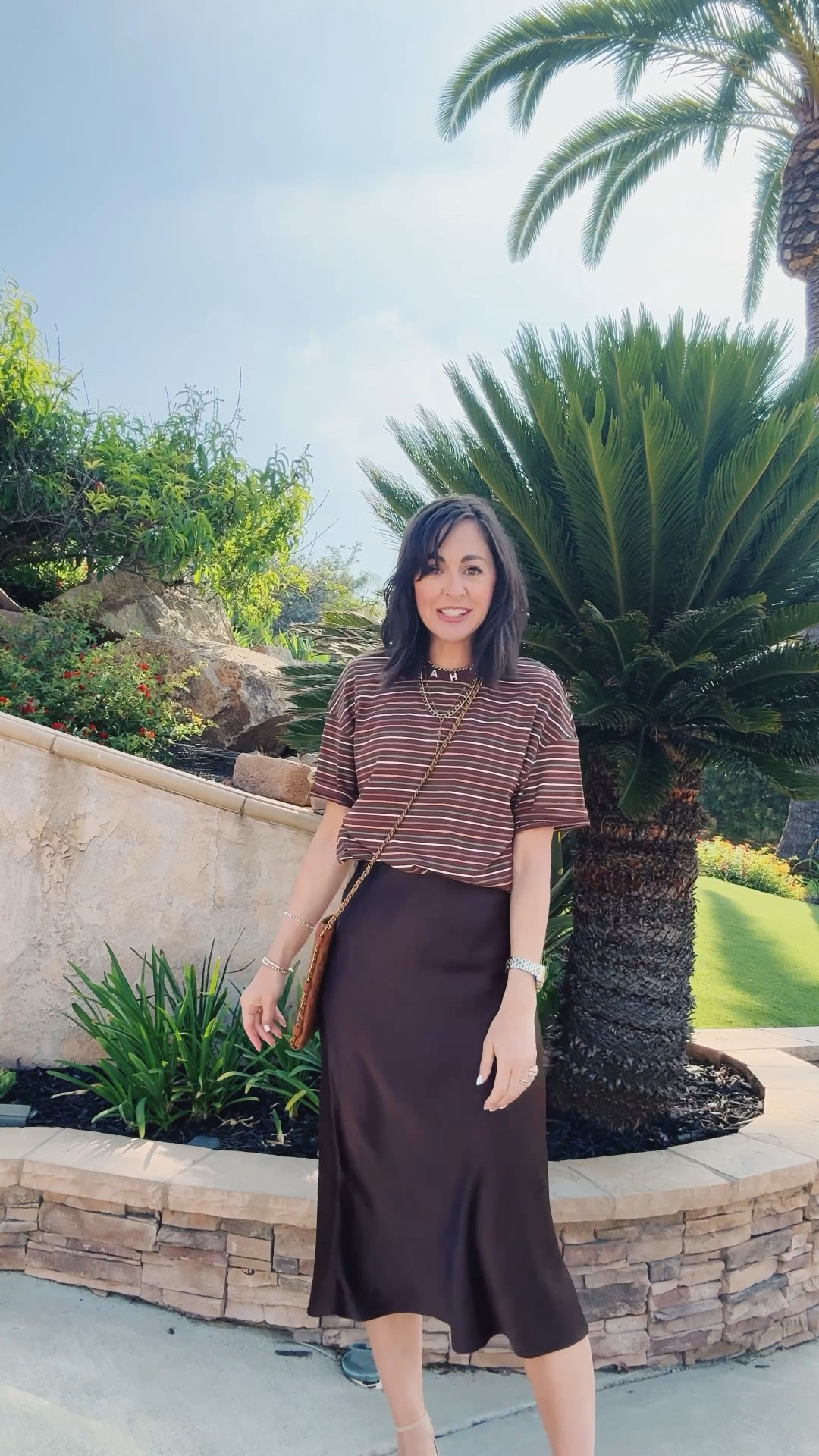 How to tuck and oversized tee into a satin skirt