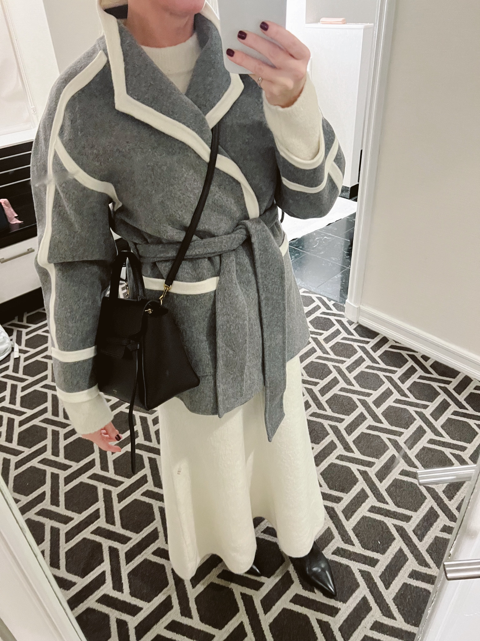 NYC look.  Found this coat on sale and the outfit underneath is super warm!!  Tall boots are a winter essential also!  