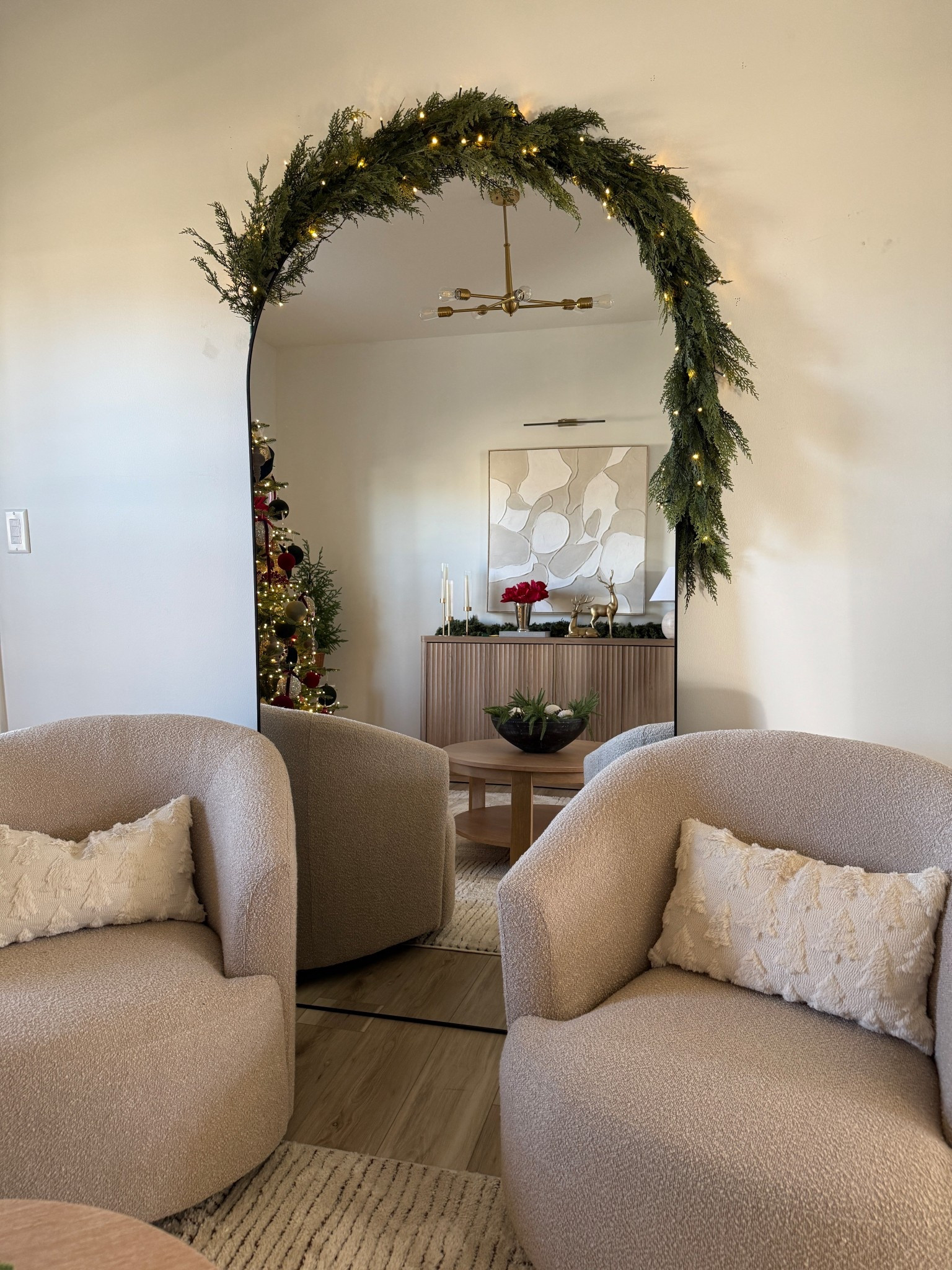 Added a little garland to our floor mirror! I have one strand of garland and one strand of lights here. The floor mirror is 81x41


#LTKHoliday #LTKHome