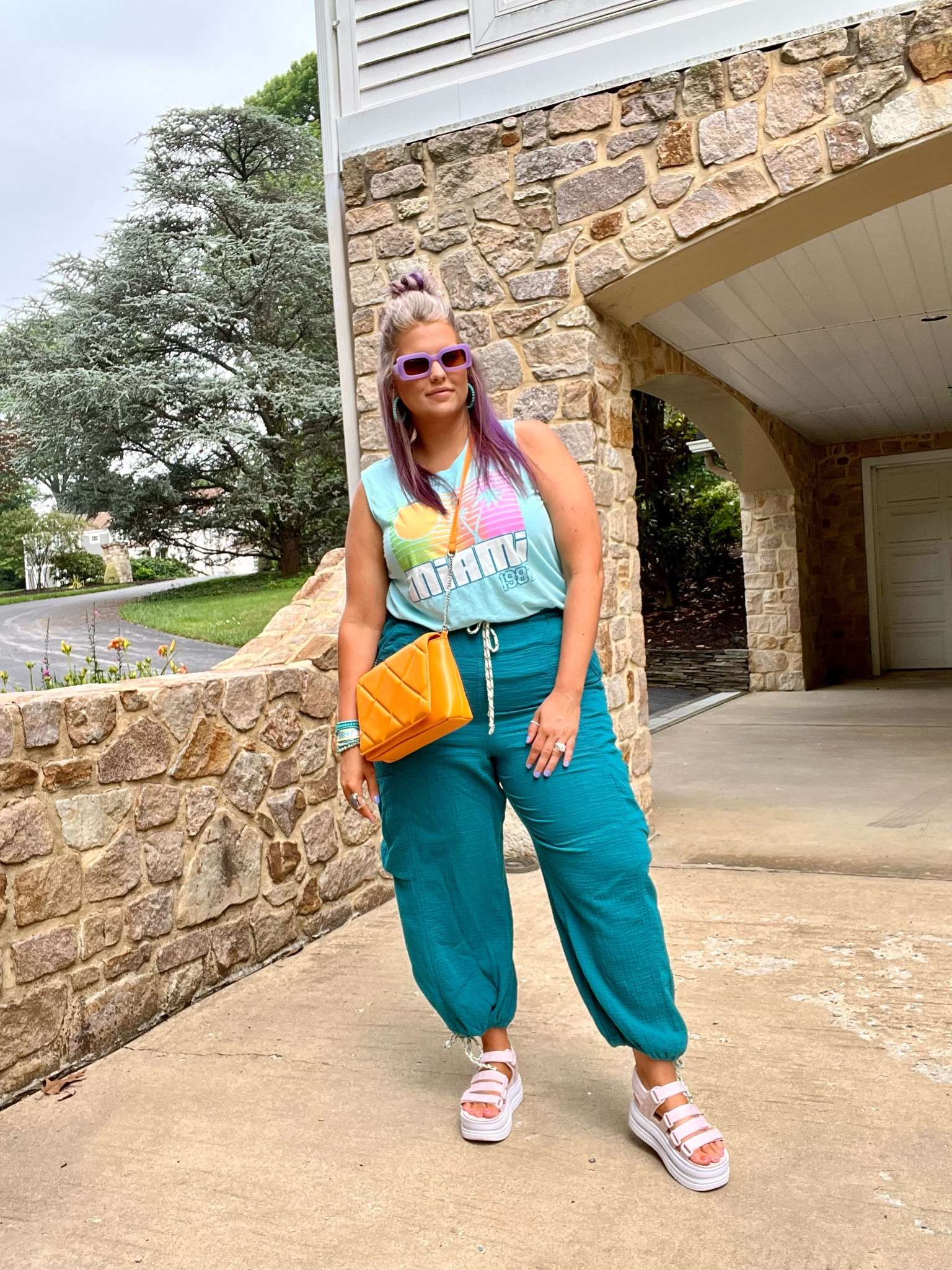 ✨SIZING•PRODUCT INFO✨
⏺ Miami Graphic Tank •• L •• TTS •• Walmart 
⏺ Teal Gauze Drawstring Cargo Pants •• linked similar 
⏺ Platform Sandals •• TTS •• Nike  
⏺ Orange Crossbody •• linked similar 
⏺ Tassel Friendship Bracelet, Turquoise Bead Stack, Turquoise Beaded Hoops •• SHEIN
⏺ Purple Sunglasses •• Temu

👋🏼 Thanks for stopping by!

📍Find me on Instagram••YouTube••TikTok ••Pinterest ||Jen the Realfluencer|| for style, fashion, beauty and…confidence!

🛍 🛒 HAPPY SHOPPING! 🤩

#walmart #walmartfinds #walmartfind #founditatwalmart #walmart style #walmartfashion #walmartoutfit #walmartlook  #graphic #tee #graphictee #graphicteeoutfit #tshirt #graphictshirt #t-shirt #band #bandtee #graphicteelook #graphicteestyle #graphicteefashion #graphicteeoutfitinspo #graphicteeoutfitinspiration #summer #sunmerstyle #summeroutfit #summeroutfitidea #summeroutfitinspo #summeroutfitinspiration #summerlook #summerpick #summerfashion #casual #casualoutfit #casualfashion #casualstyle #casuallook #weekend #weekendoutfit #weekendoutfitidea #weekendfashion #weekendstyle #weekendlook #travel #traveloutfit #travelstyle #travelfashion #airport #airportoutfit #airportstyle #airportfashion #travellook #airportlook #blue #darkblue #lightblue #navy #navyblue #babyblue #cobaltblue #grayblue #teal #tealblue #blueoutfit #blueoutfitinspo #bluestyle #blueshirt #bluepants #blueoutfitinspiration #outfitwithblue #bluelook 
#under10 #under20 #under30 #under40 #under50 #under60 #under75 #under100
#affordable #budget #inexpensive #size14 #size16 #size12 #medium #large #extralarge #xl #curvy #midsize #blogger #vlogger
budget fashion, affordable fashion, budget style, affordable style, curvy style, curvy fashion, midsize style, midsize fashion


#LTKunder50 #LTKcurves #LTKstyletip