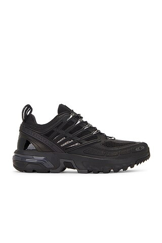Salomon ACS Pro Advanced in Black from Revolve.com | Revolve Clothing (Global)