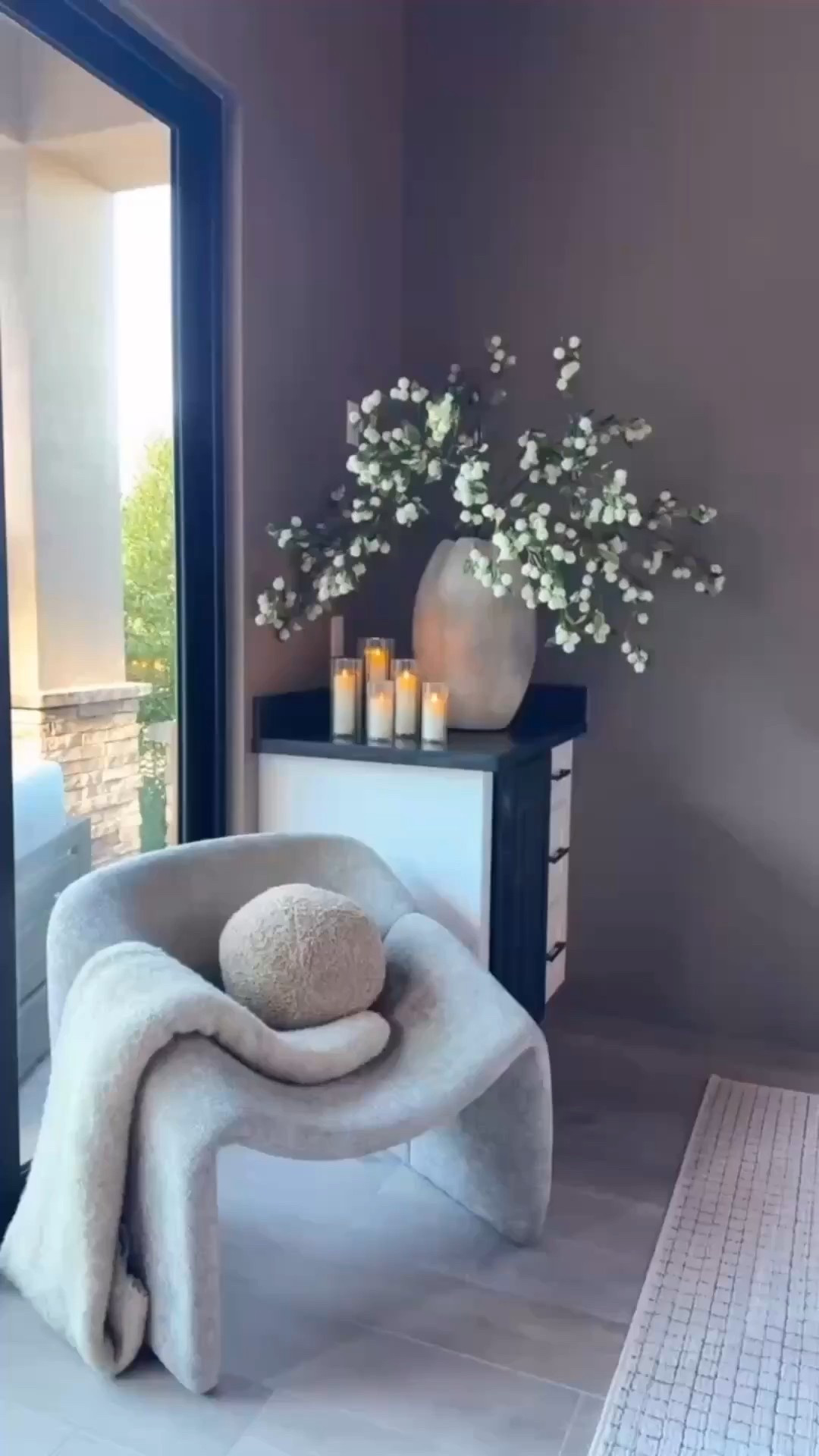 I love how the texture, tones, and calm give this space its quiet character. The plush accent chair with its soft corners feels so inviting, and the florals truly elevate the corner. ✨

#neutralhome
#moderndesign
#textureddetails
#cozyspaces
#warmneutrals
#homeinspo
#modernliving
#earthytones
#minimalhome
#interiorinspo


#LTKvlog #LTKHome #LTKdayinmylife